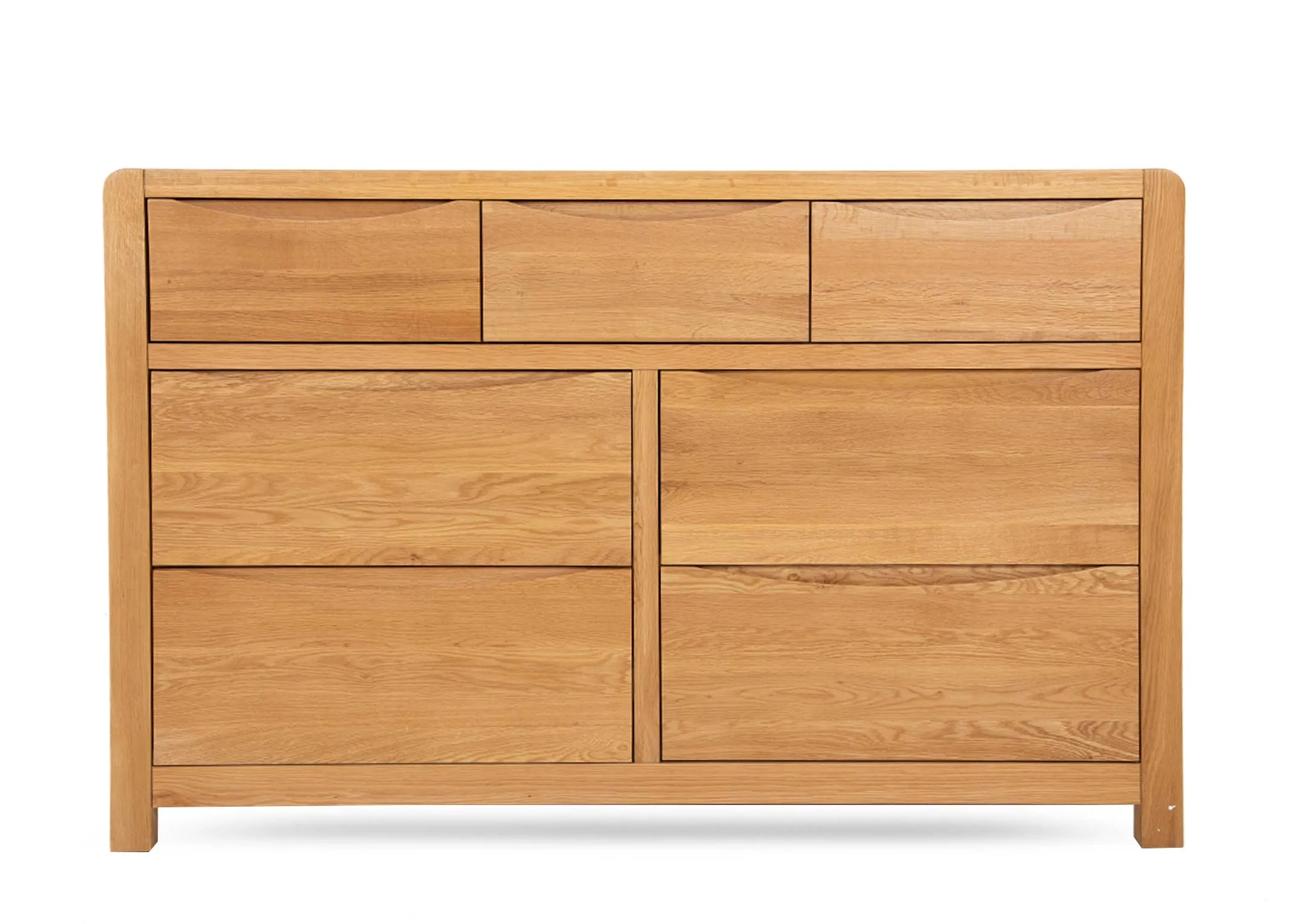 An oak chest of 7 drawers from EZ Livings Iris range. Front view of 3 small drawers over 4 larger drawers