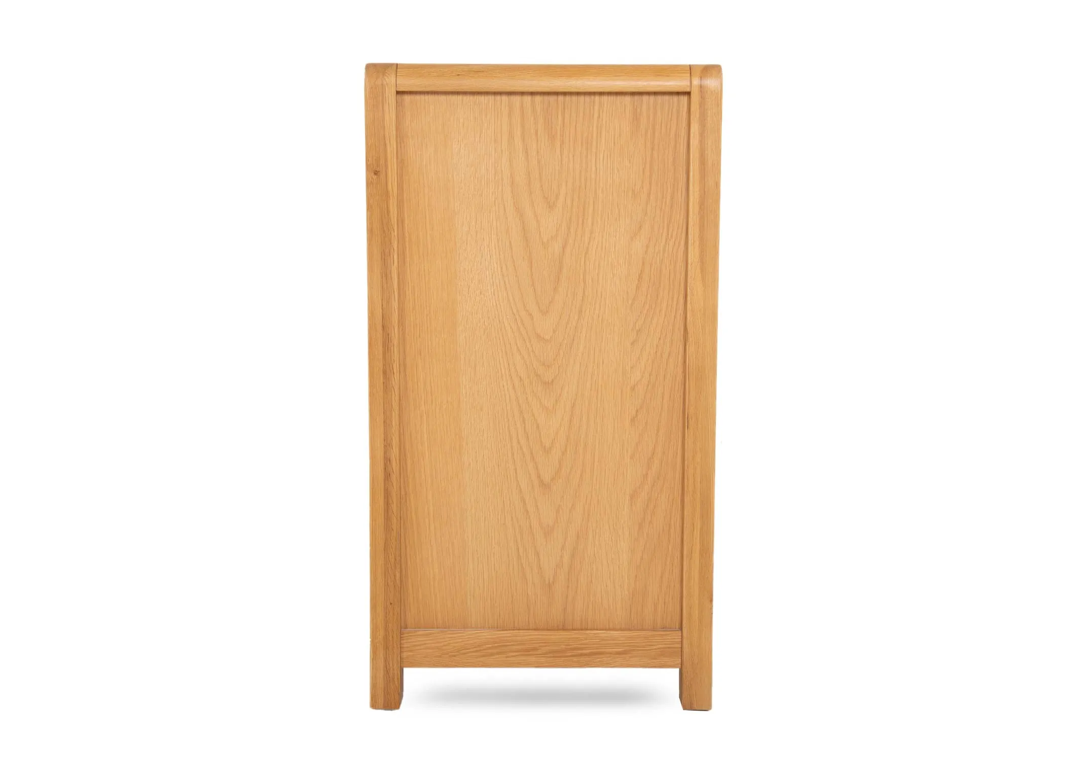 An oak chest of 7 drawers from EZ Livings Iris range. Side view of small sturdy feet