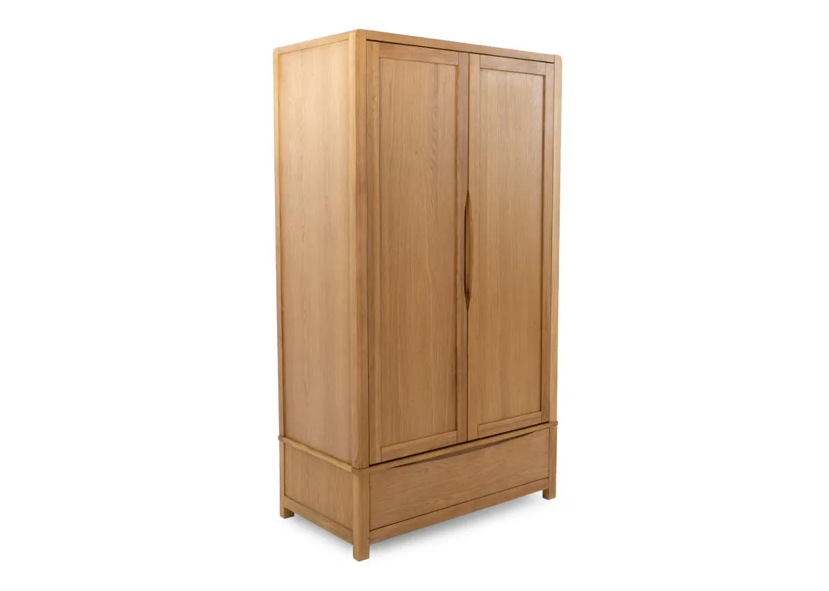 A 2 door oak wardrobe from EZ Livings Iris range. Angled view of door closed.