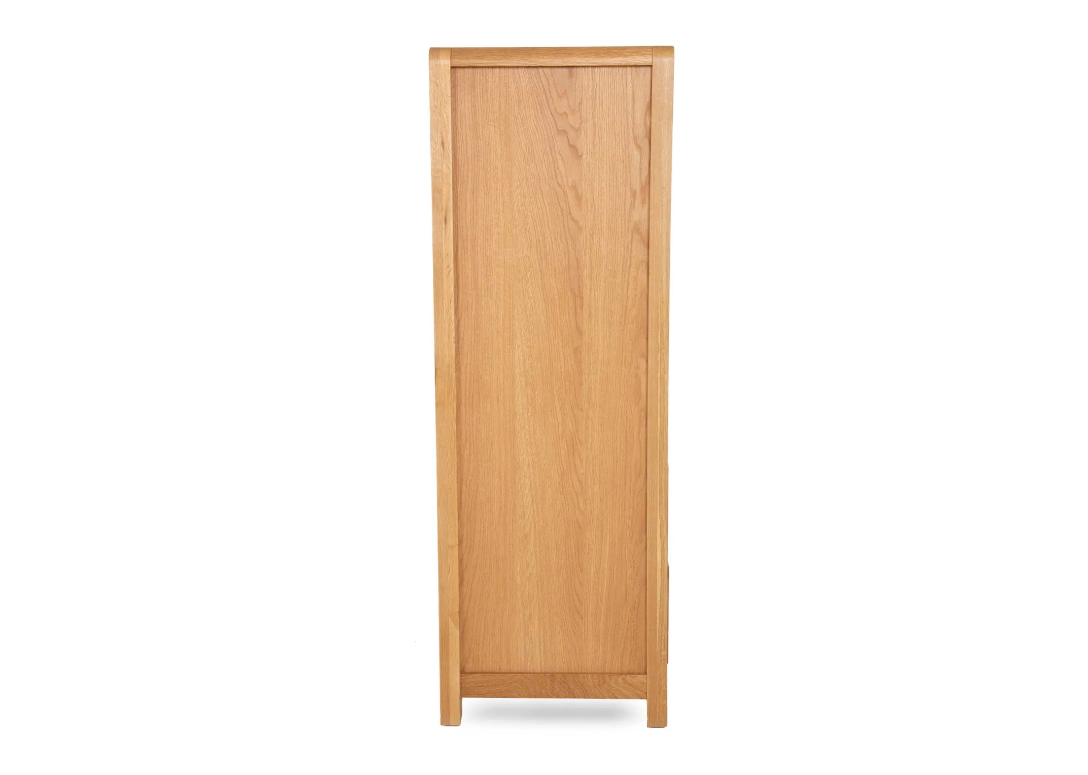 An oak tallboy with 2 over 4 drawers from EZ Livings Iris range. Side view of small feet