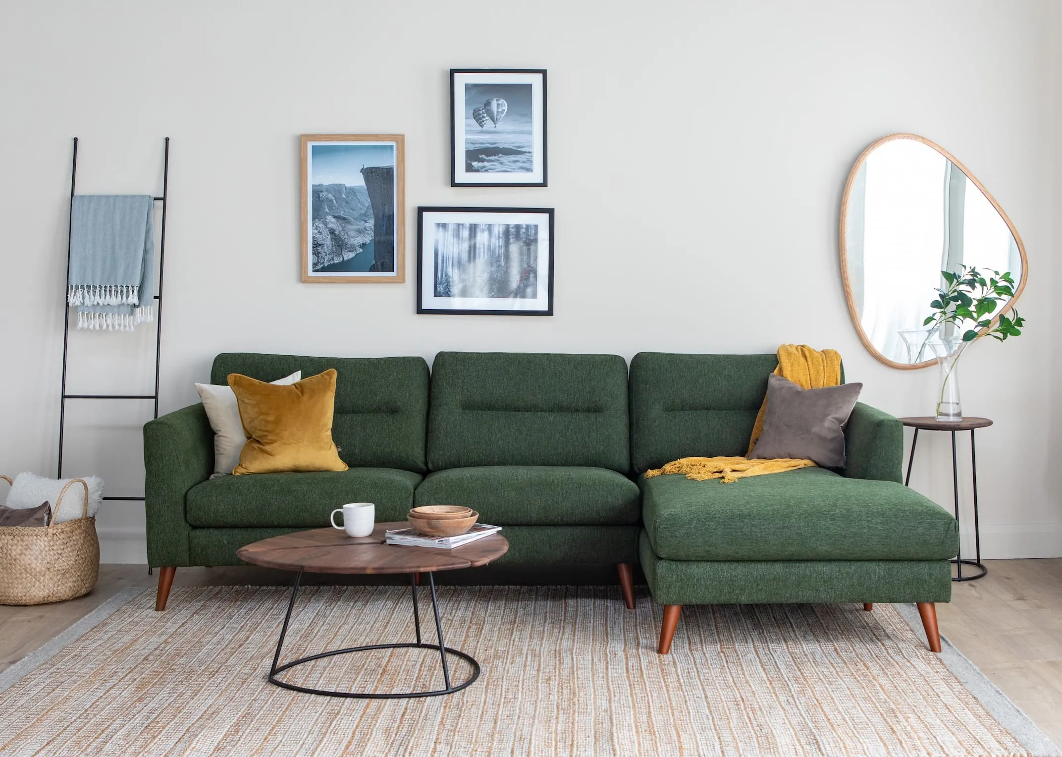 A lifestyle image of the Presley Corner Chaise with Shard tables & siem ladder with cody mirror