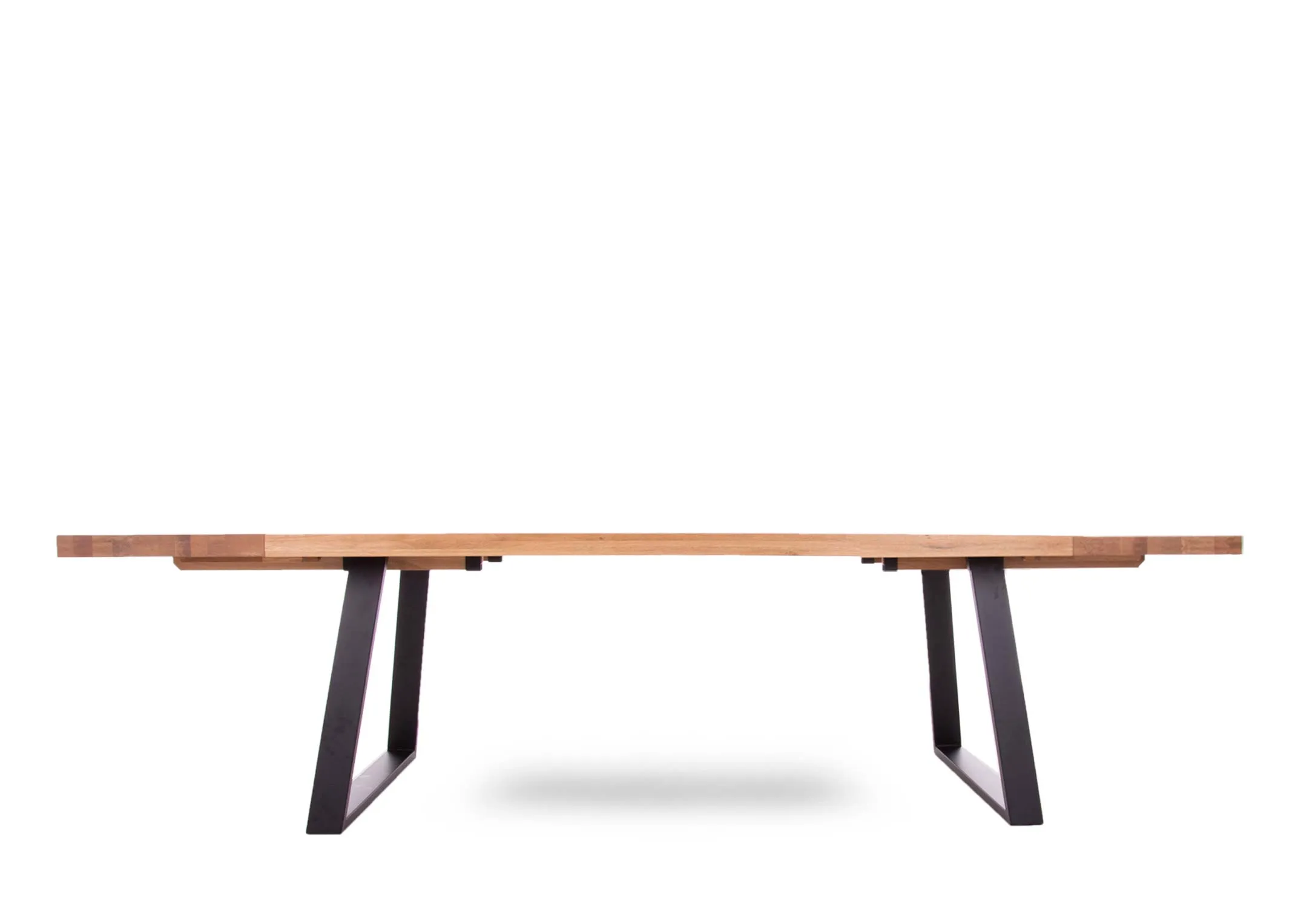 A 200cm oak dining table with metal legs from EZ Living Furniture's Renvyle range. Front view of table with extension leaf