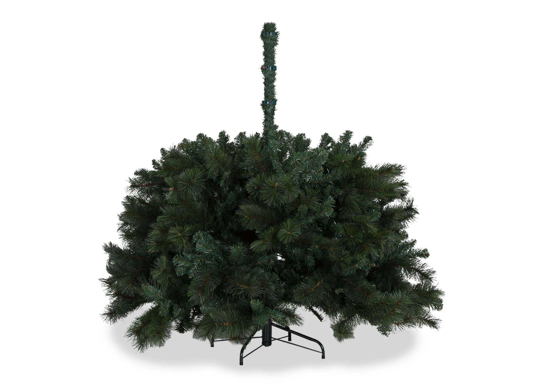 A 10ft mixed pine needle artificial Christmas tree from EZ Living's Sherwood range. Closeup of pine tree