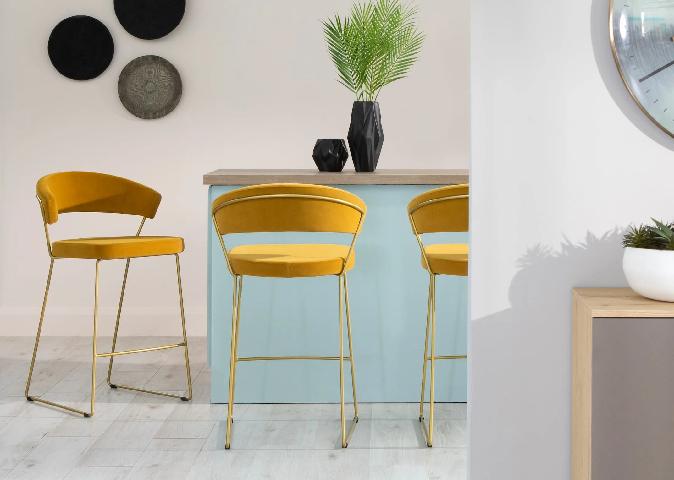 A lifestyle image of a kitchen setting with New York Stools with karibi & clavinas plates from EZ Living Furniture.