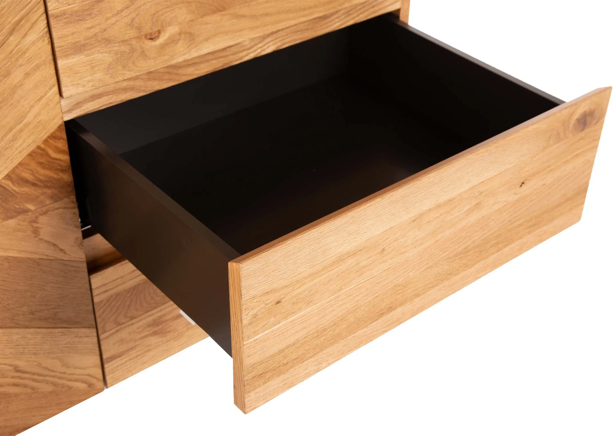 A rustic oak 2 door 3 drawer sideboard from EZ Living Furniture's Ellipse range. Closeup of metal drawer interior