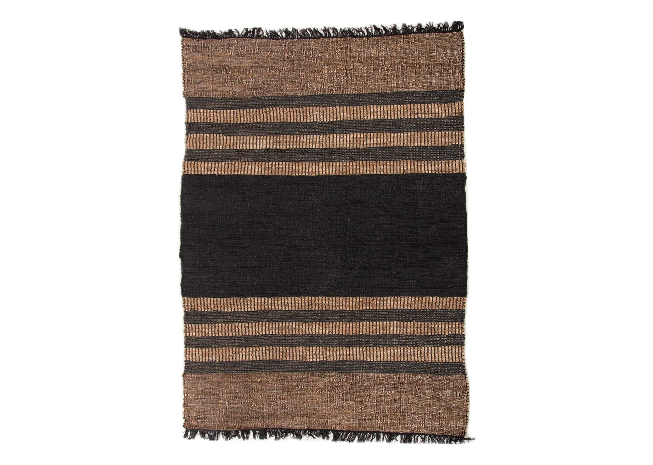 A brown & black stripped woven rug from EZ Livings Vagium range. Closeup of under rug showing no lining