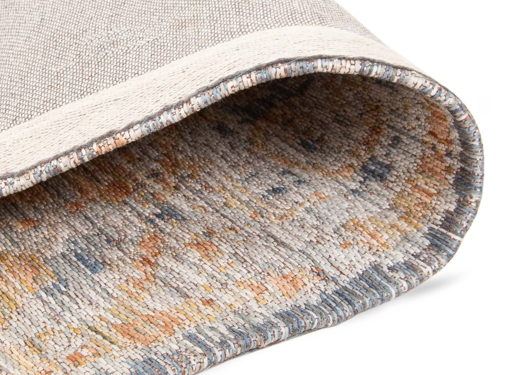 A peach & blue persian print on an ivory rug from EZ Living Furniture's Maxima range. Angled view shows print.