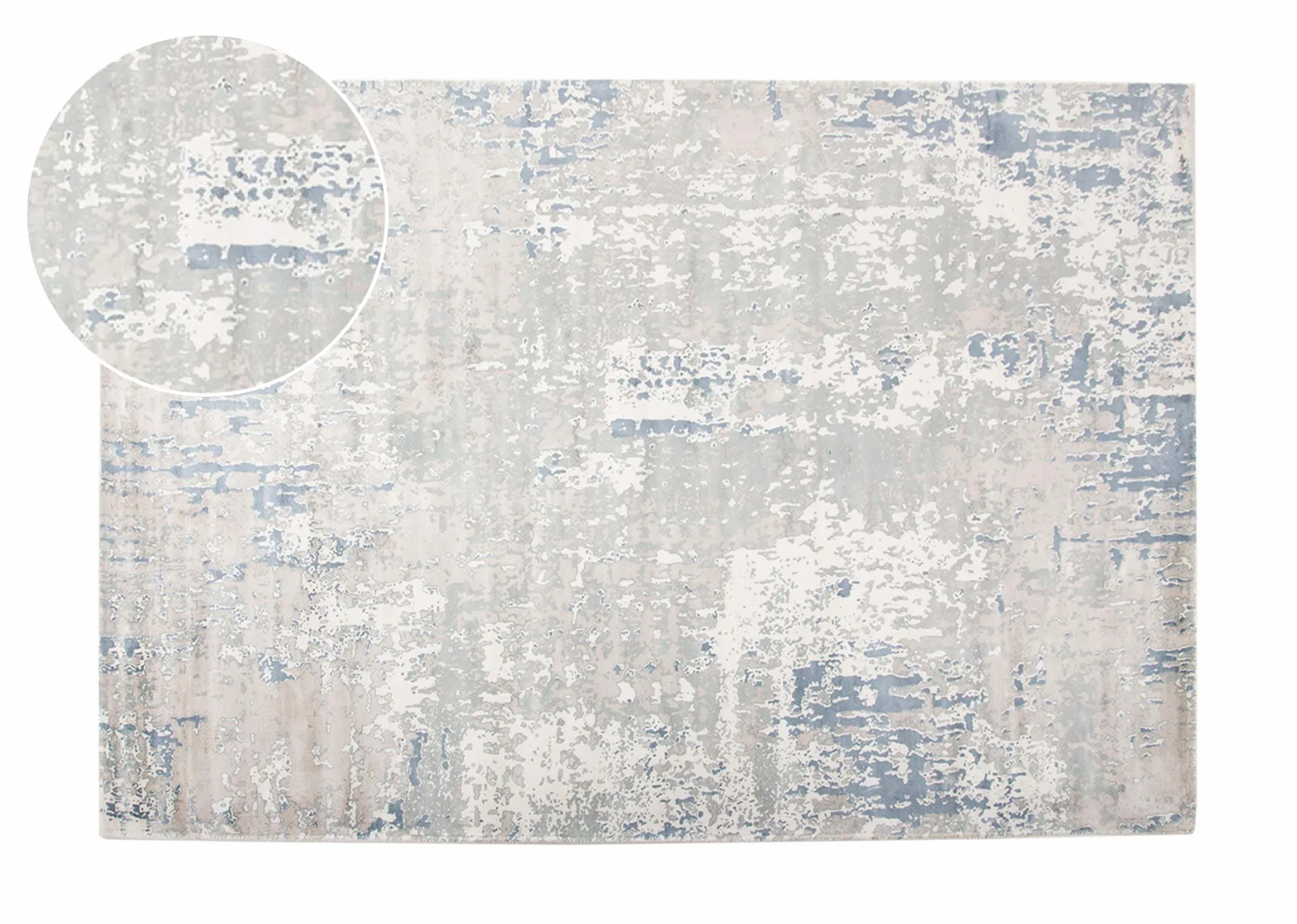 A large blue & silver distressed rug from EZ Livings Moderno range.Front view of the distressed rug with closeup of pattern