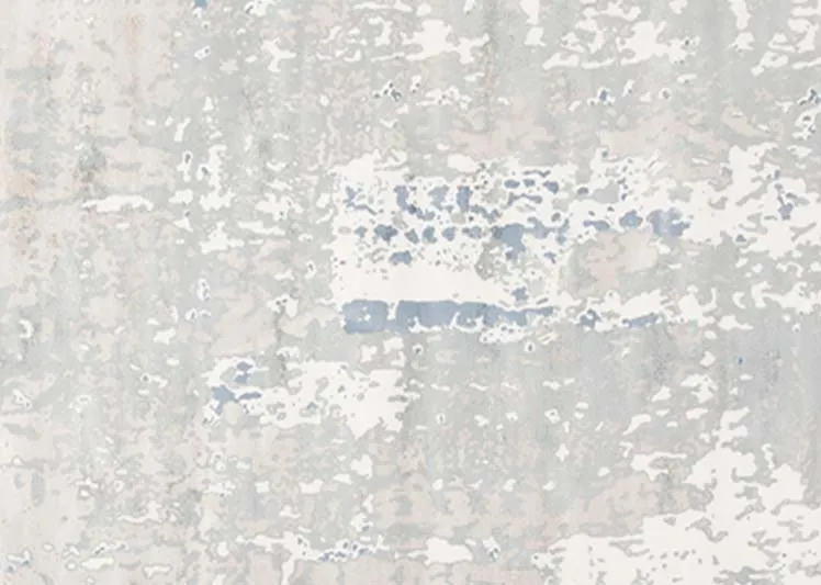 A blue & silver distressed medium rug from EZ Living's Moderno range. Front view of textures.