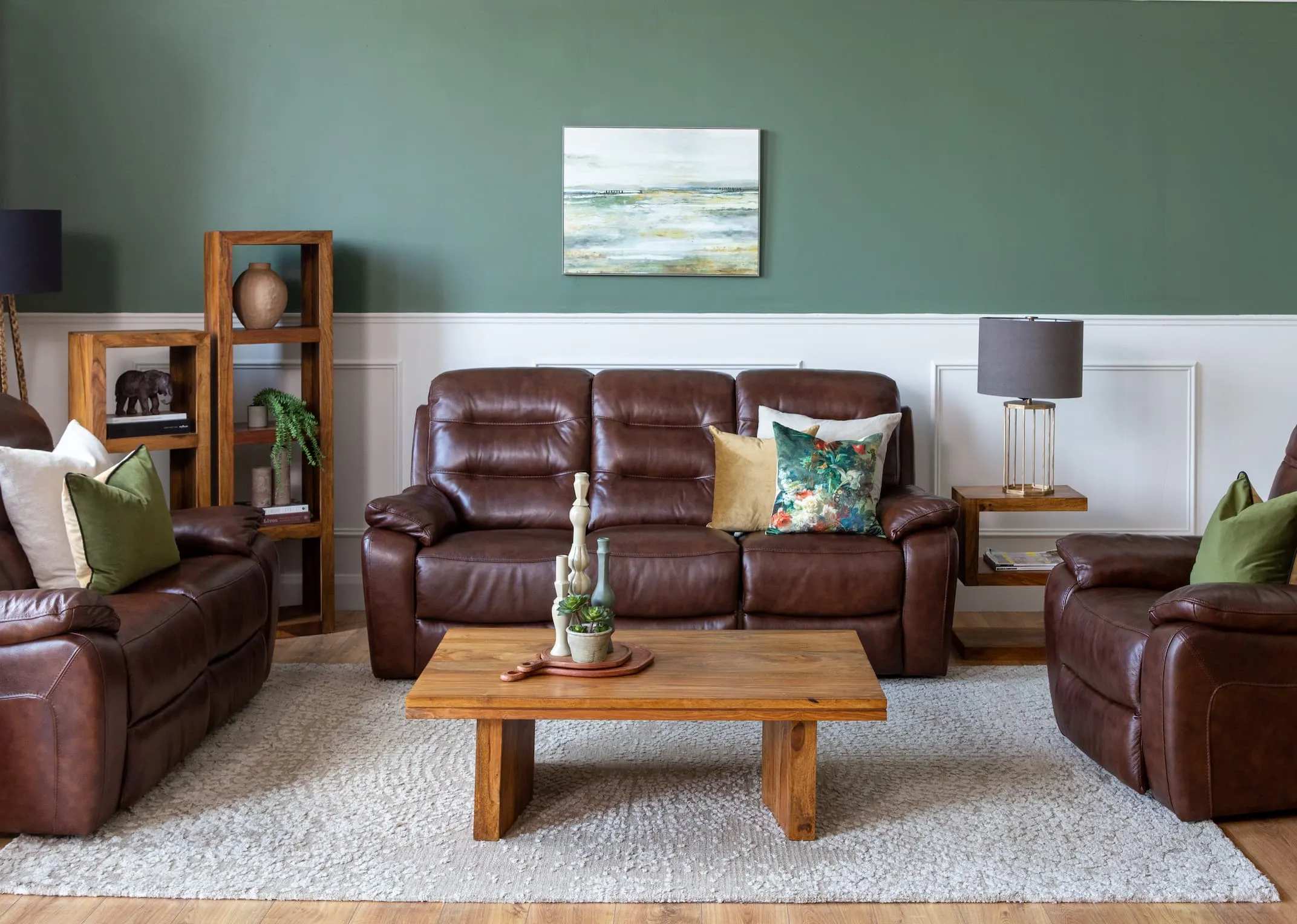 A lifestyle image of the Supreme Brown leather sofa with India coffee table on milton rug.
