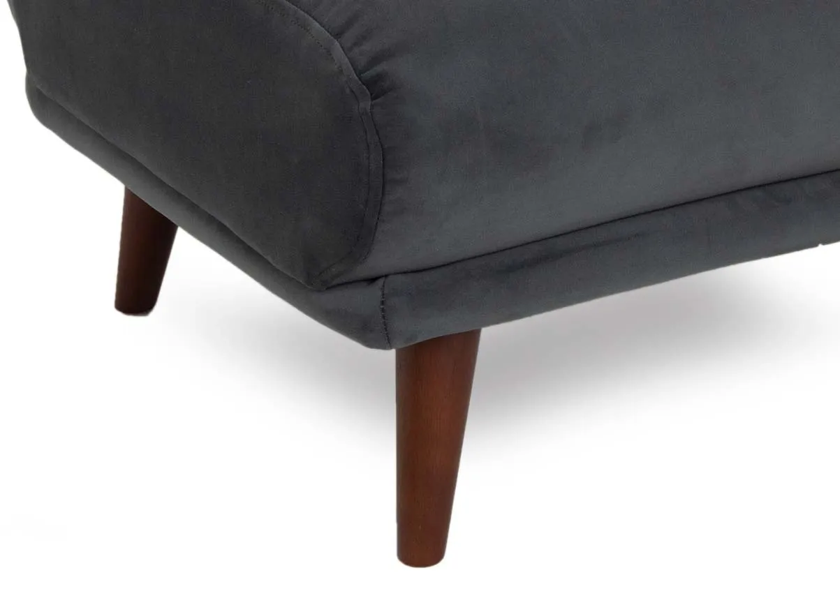 A small grey velvet footstool from EZ Living Furniture's Girona range.  Closeup of tapered wood leg