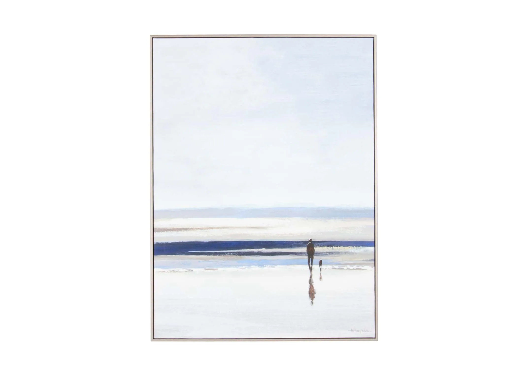 A silver framed canvas of an ocean with a person strolling toward from EZ Living's Shoreline range. Front view of blue tones