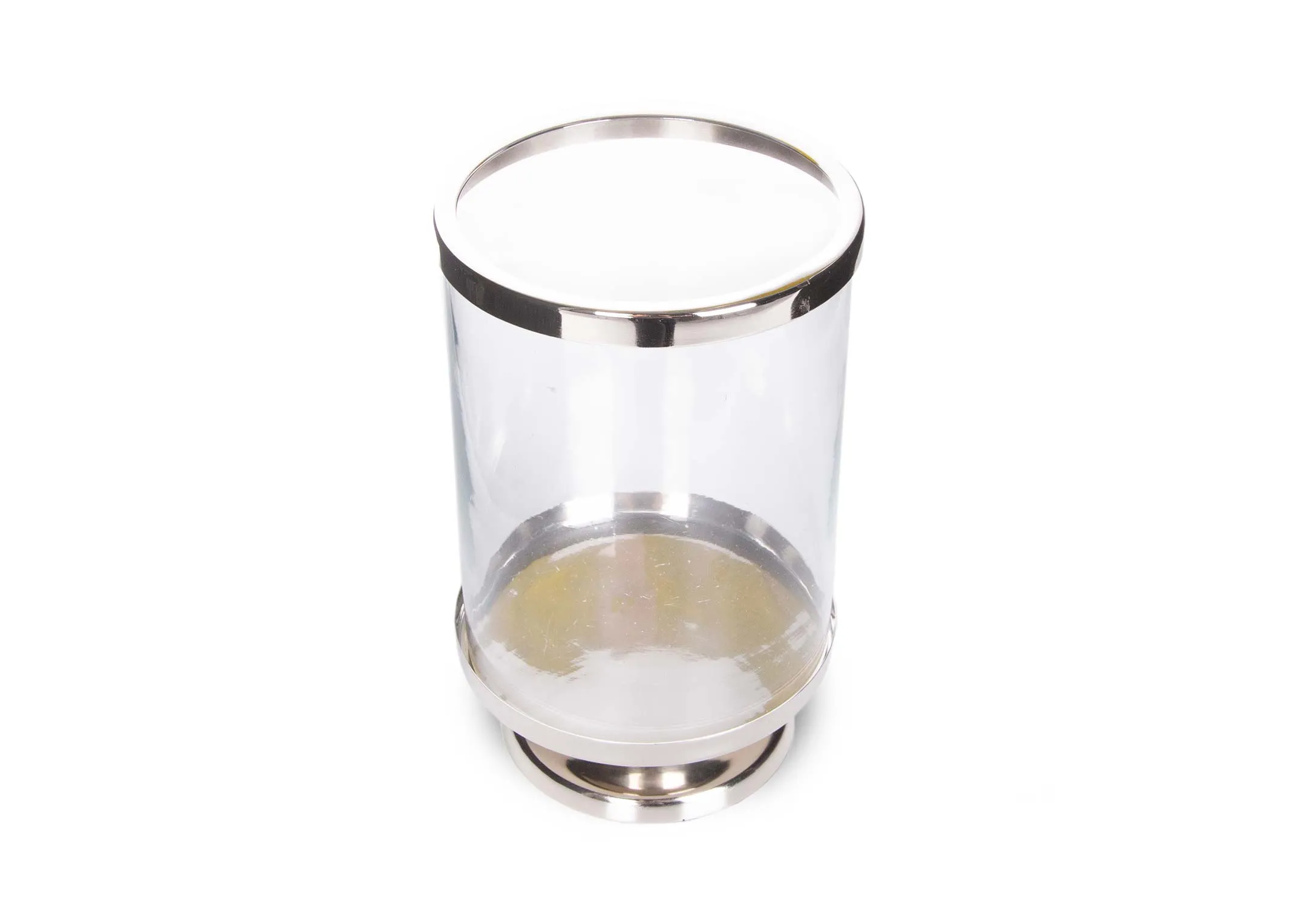A medium glass pillar candleholder with silver base from EZ Living Furniture's Rhinestone range. Angled view.