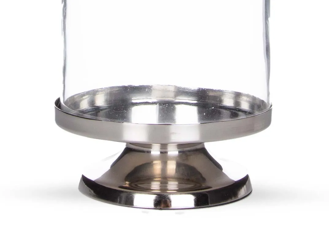 A medium glass pillar candleholder with silver base from EZ Living Furniture's Rhinestone range. Closeup of silver base