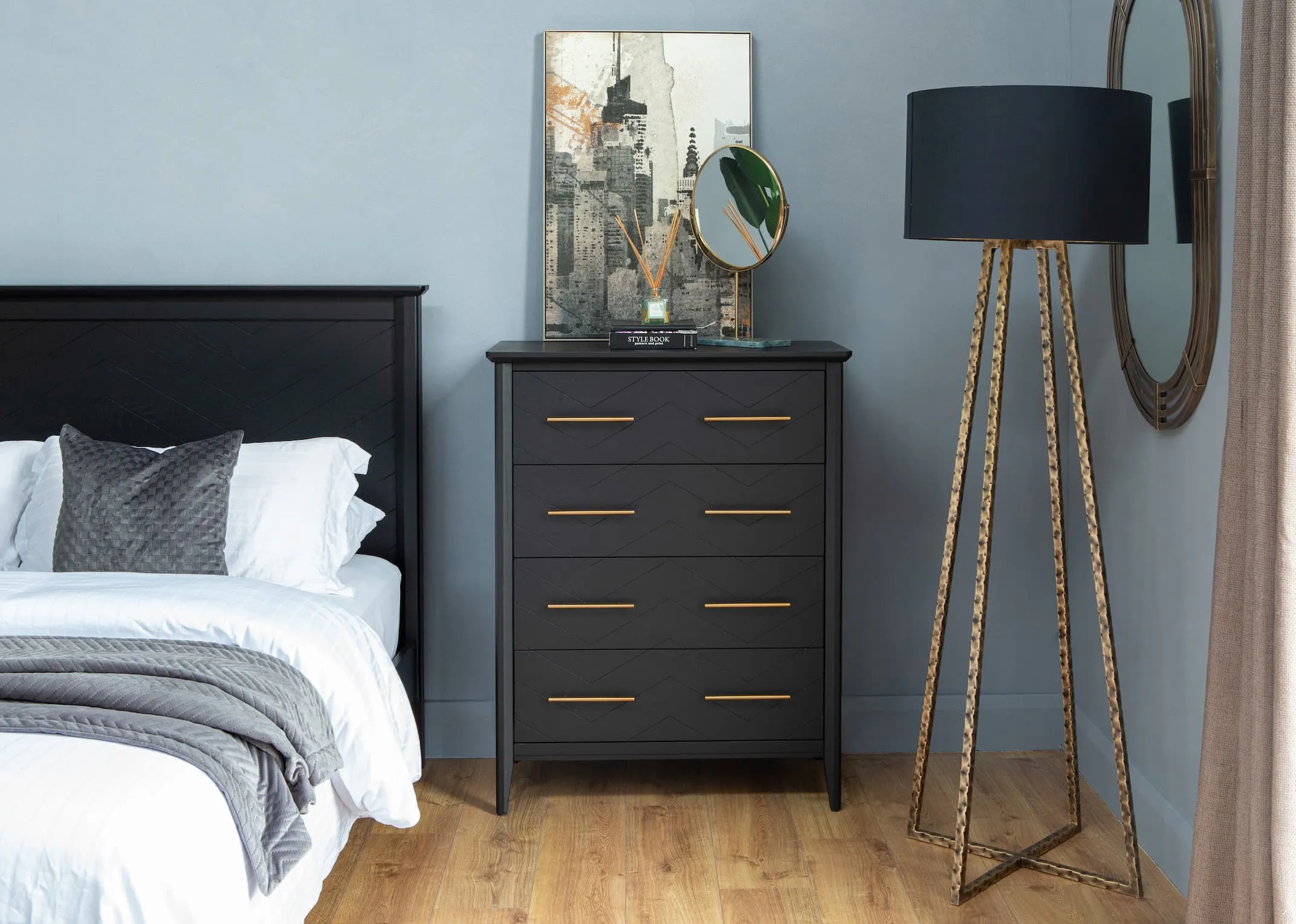 A lifestyle image of the Chevron bed & 4 drawer chest with NY Highlife print & riesco mirrors