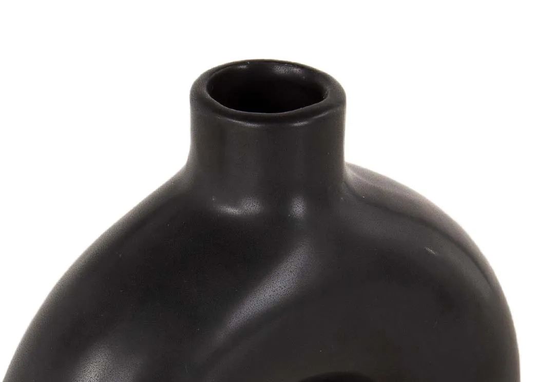 A black round doughnut vase from EZ Living's Vita range. Closeup of vase opening for stems.