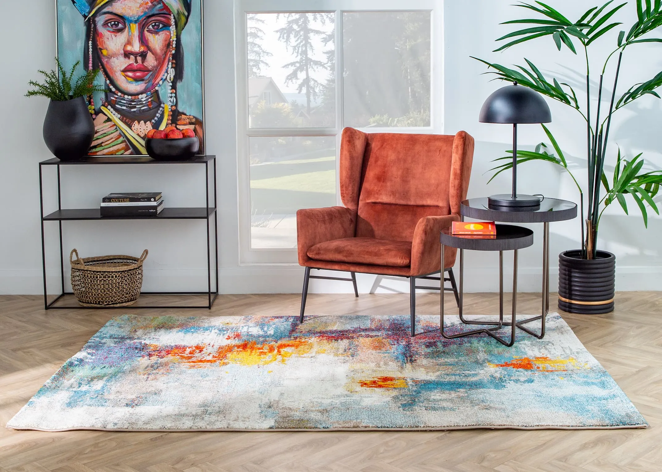 A lifestyle image of the Abstract rug with the pebble console