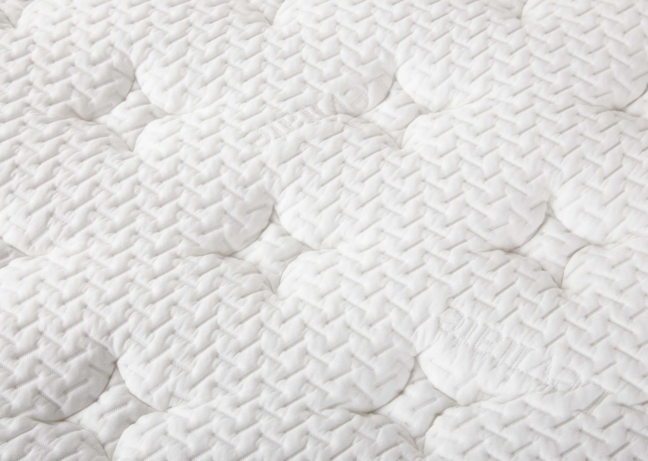 A 4ft6 mattress with 2000 pocket springs from EZ Living's Therma-cool range. Closeup of texture & pocket springs