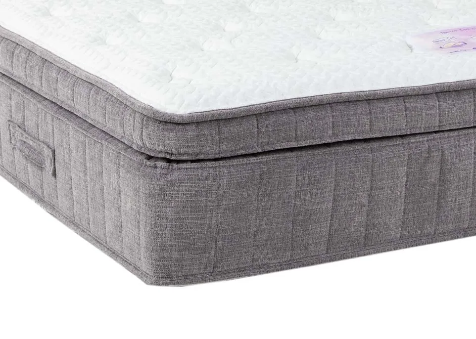 A 5ft mattress with 2000 pocket springs from EZ Living's Therma-cool range. Closeup of mattress edge trim & handle