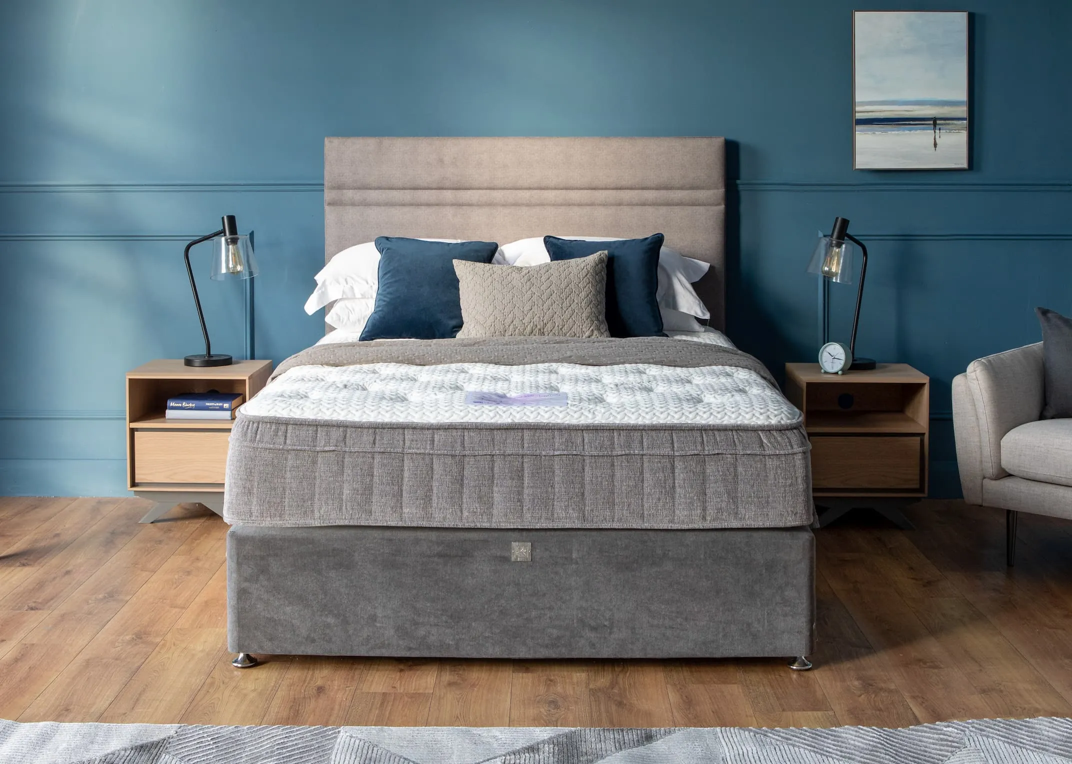 A lifestyle image of the Therma Cool 2000 on a divan bed base with brunel bedside lockers & karina lamps