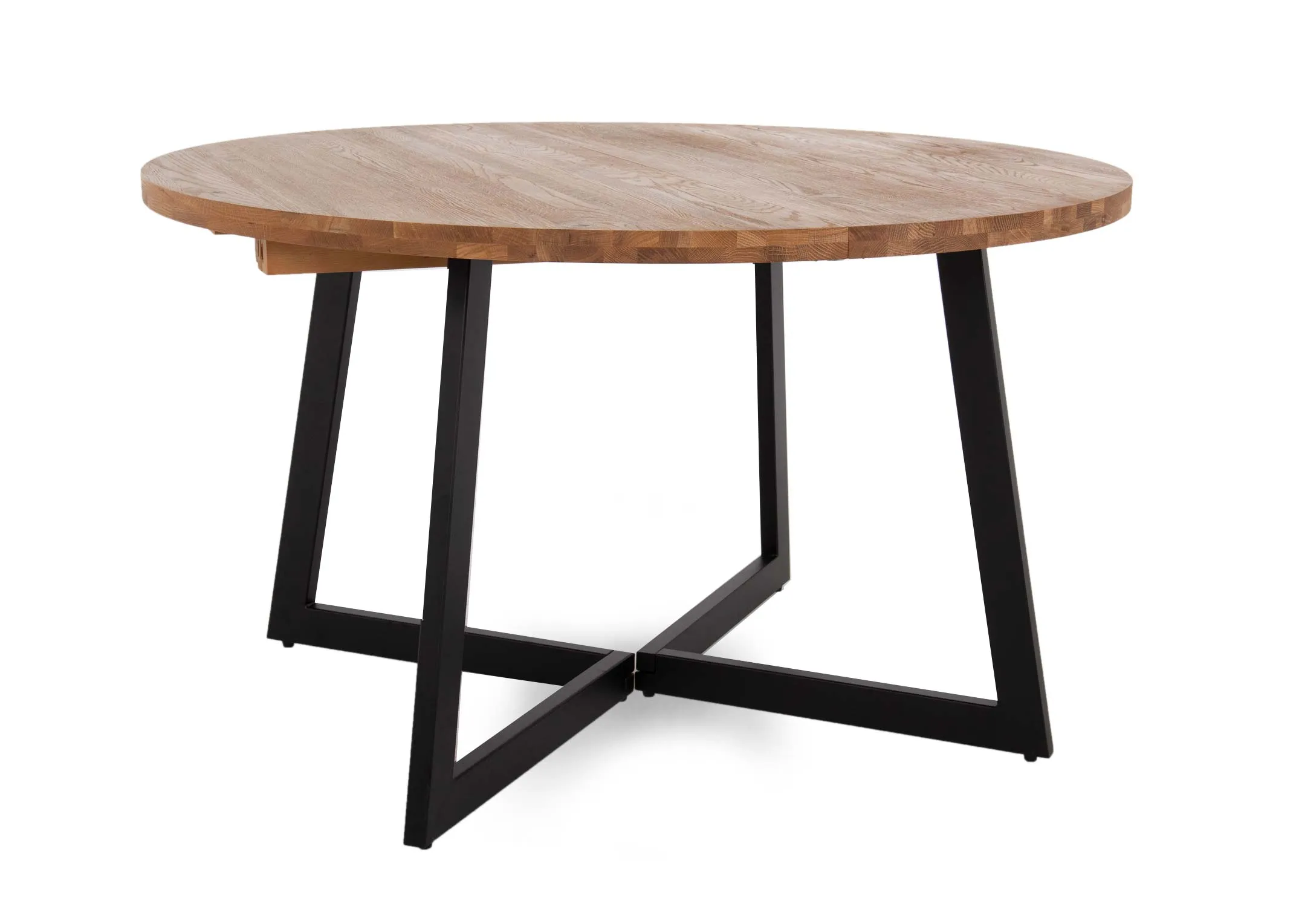An oak round to oval extendable dining table from EZ Livings Renvyle range. Angled view of table unextended