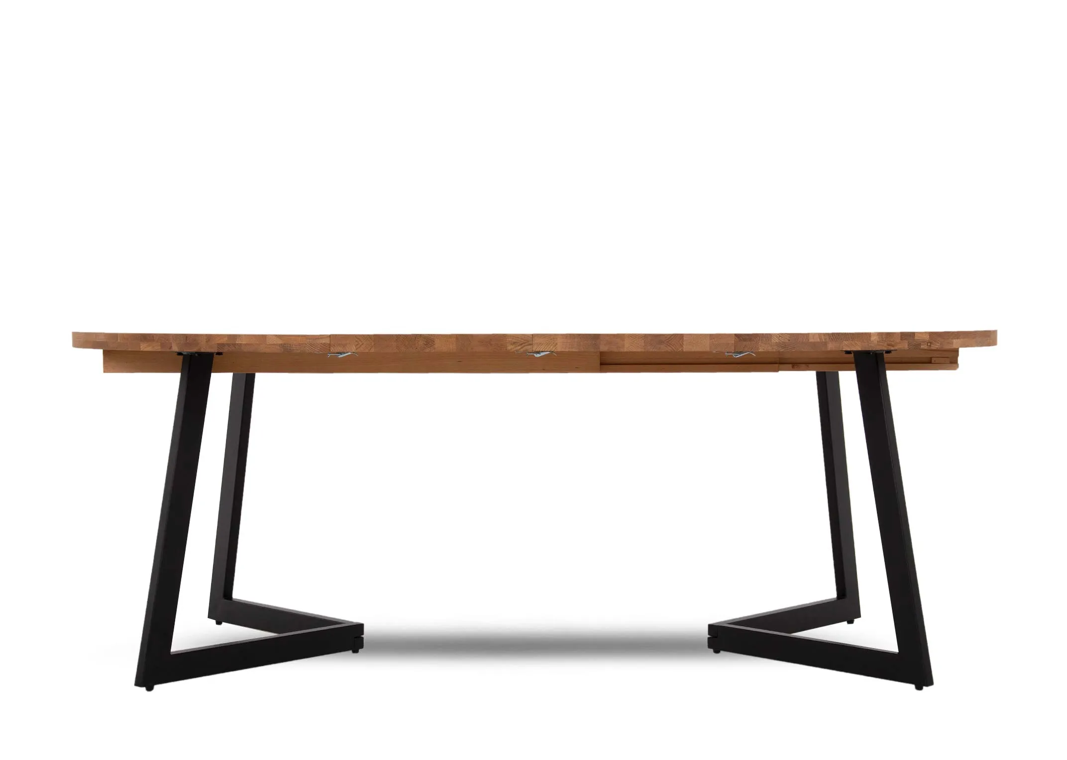 An oak round to oval extendable dining table from EZ Livings Renvyle range. Front view of table fully extended