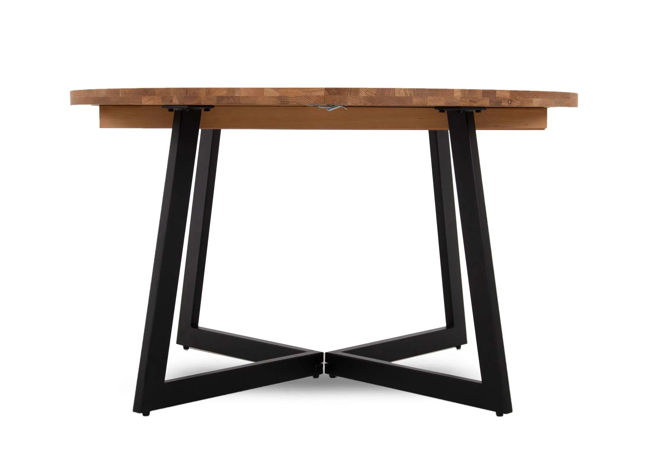An oak round to oval extendable dining table from EZ Livings Renvyle range. Side view of metal frame