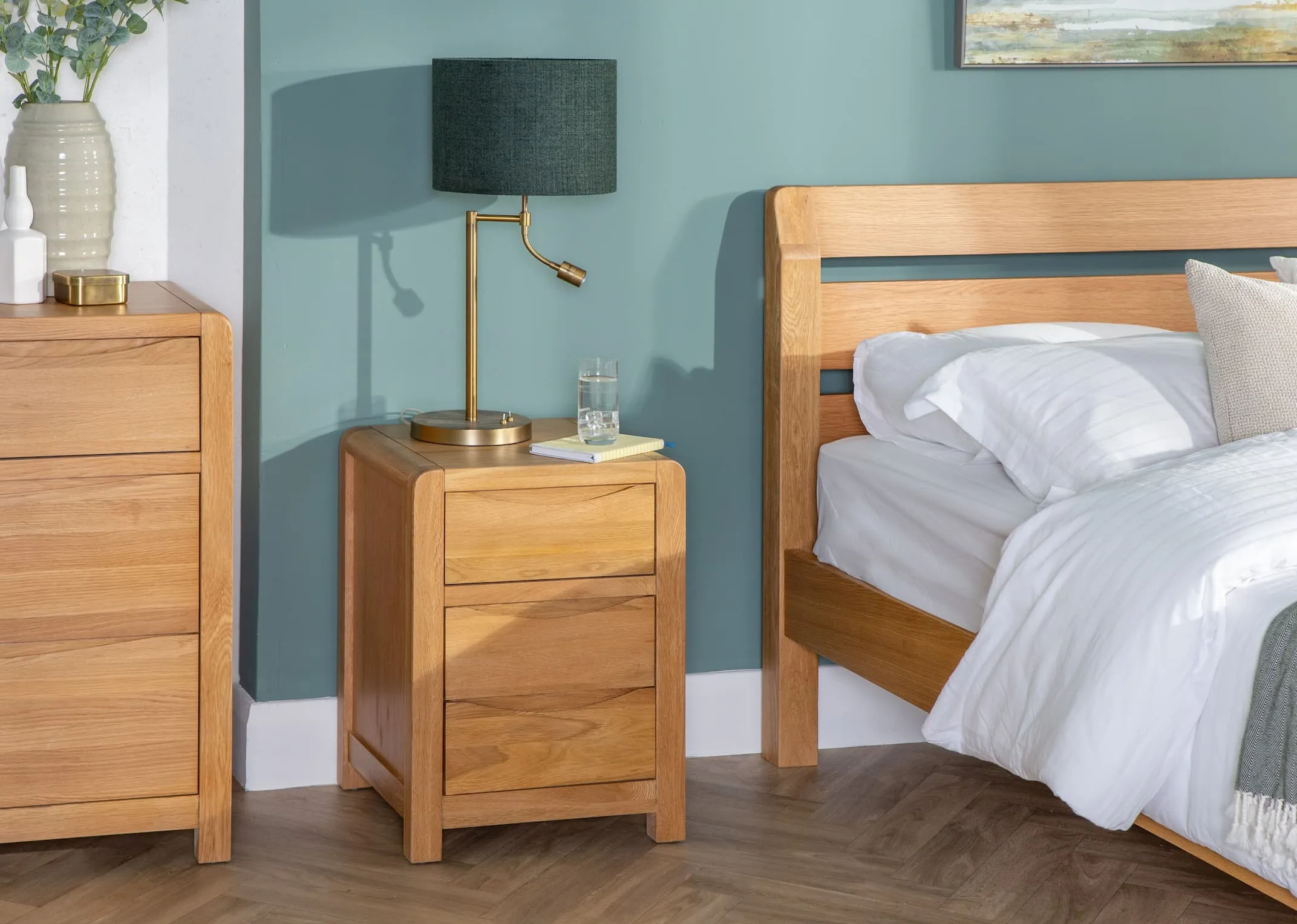 A lifestyle image of the oak Iris locker with chests