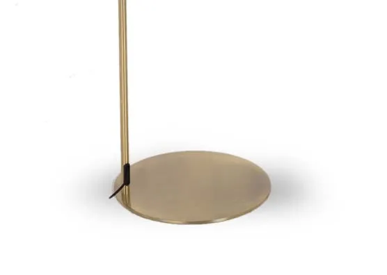 An antique bronze floor lamp with glass shade from EZ Living Furniture's Rakel range. Closeup pf simple gold round base