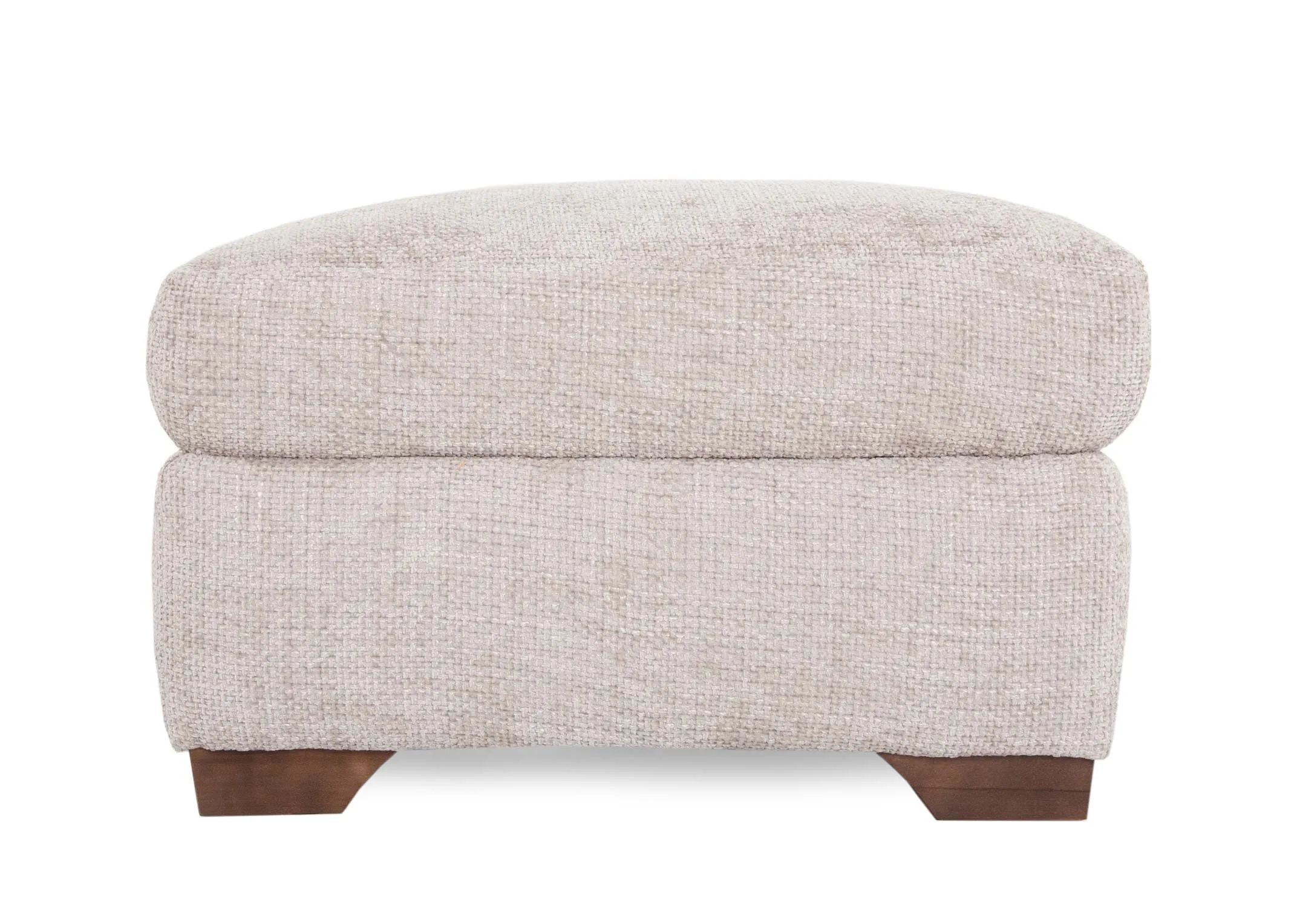 A large beige fabric footstool with wood feet from EZ Livings Aurora range. Side view showing seat room
