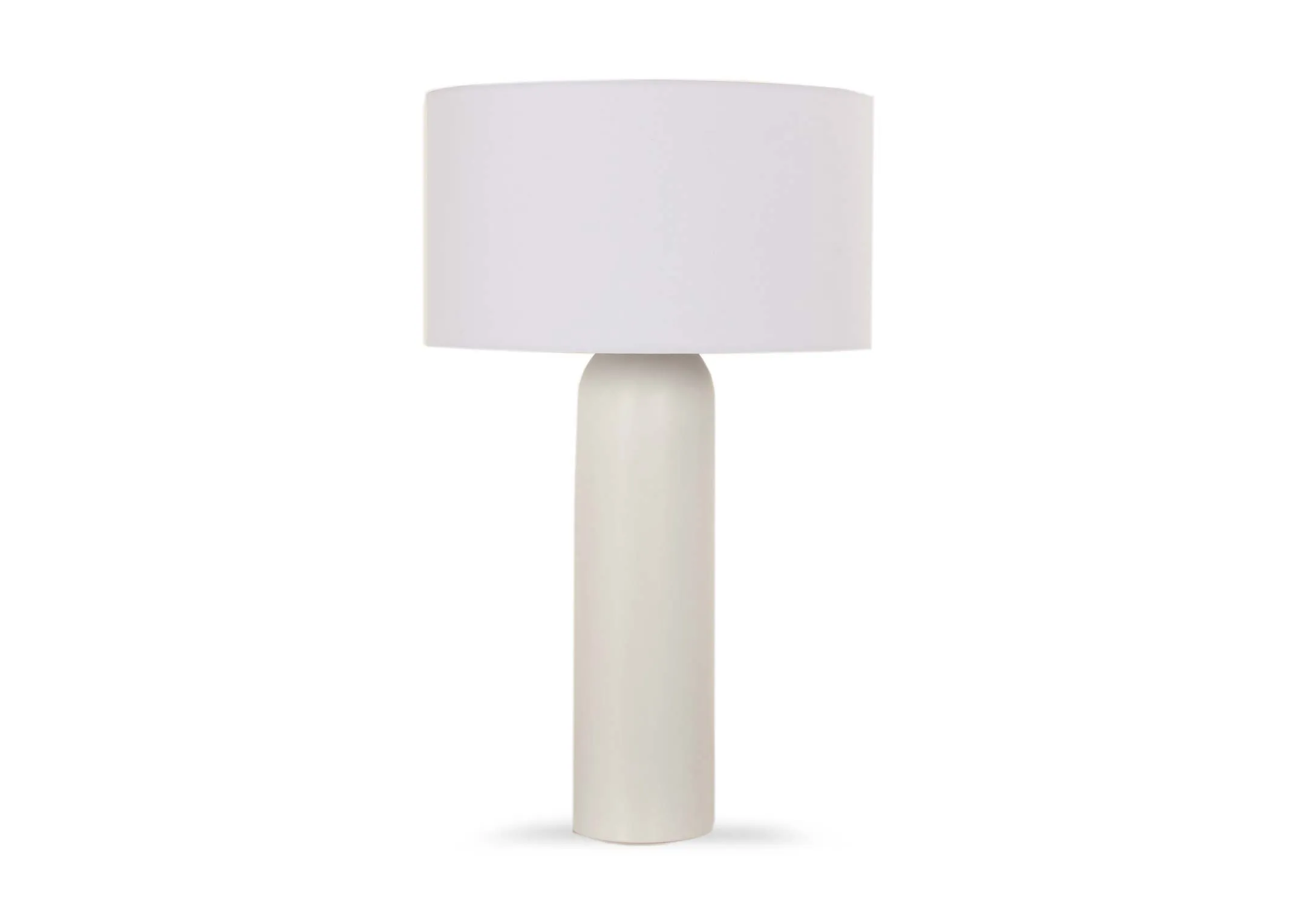 A cream table lamp with wide brim shade from EZ Livings Saturn lamp. Front view