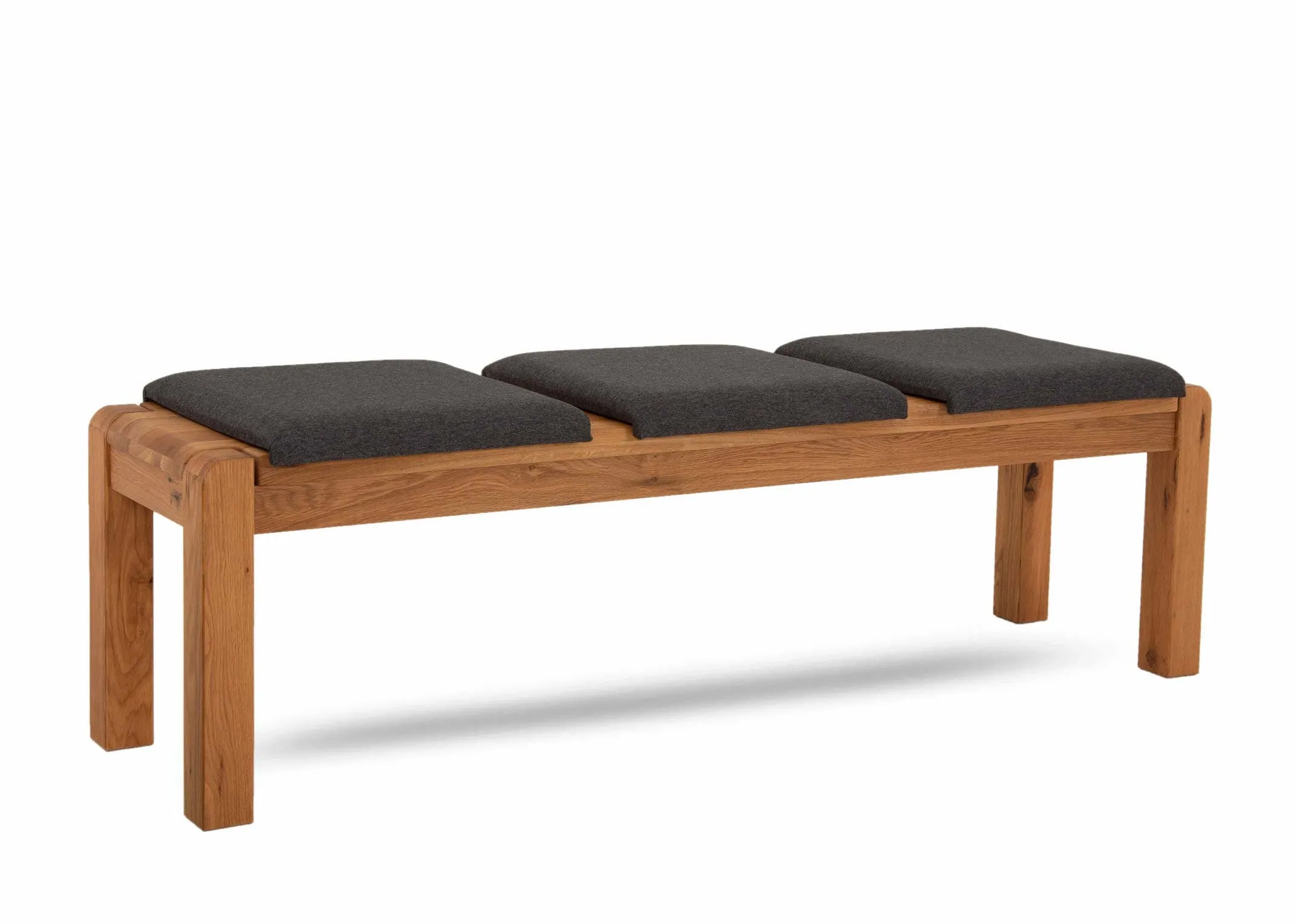A set of 3 fabric seat pads in grey from EZ Livings Como range. Angled view of 3 pads on the bench