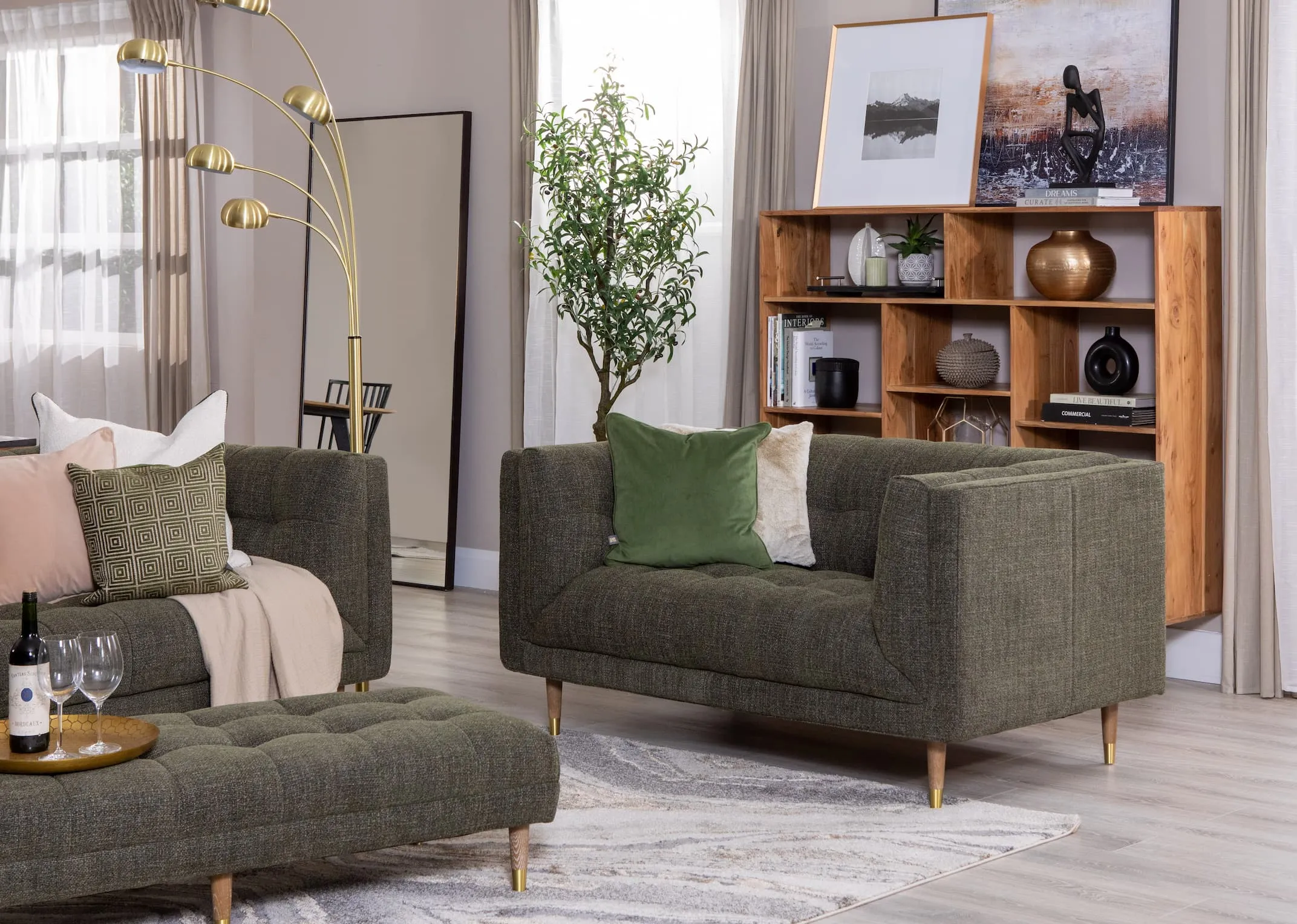 A lifestyle image of the Grace 2 Seater sofa with Mango display unit and Savonna lamp.