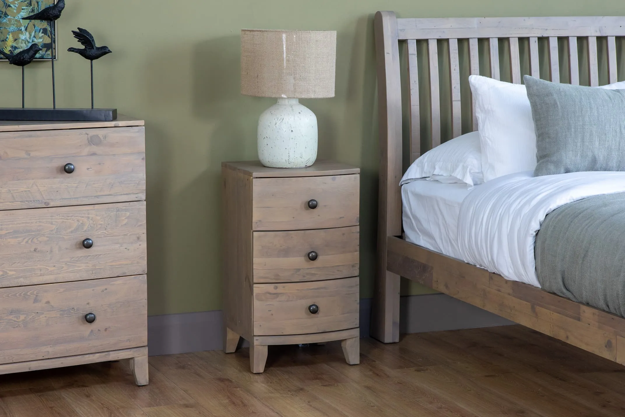 A lifestyle image of the Bria bedside locker with