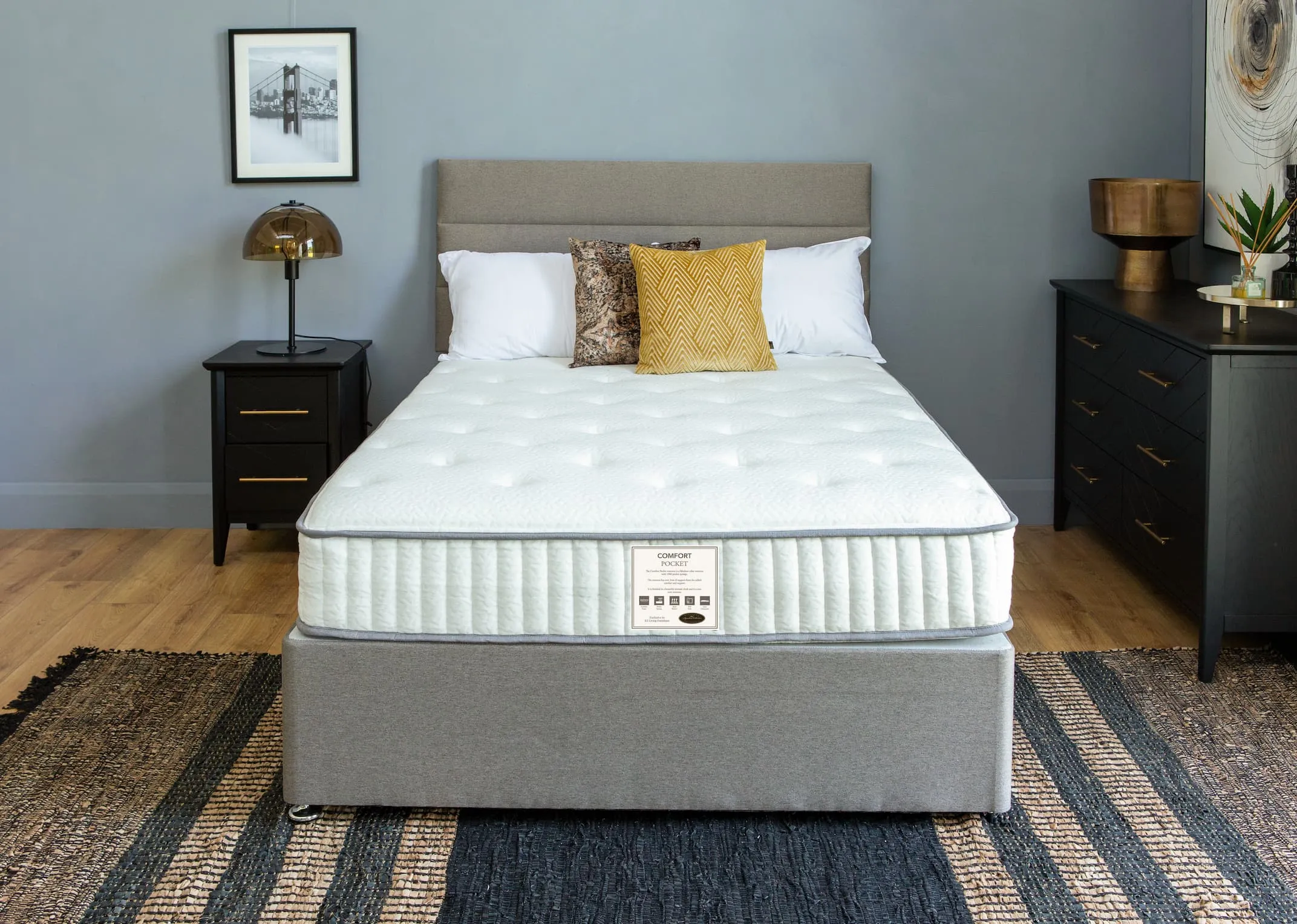 A lifestyle image of the Comfort Pocket mattress with Venice bed base & Circles print with Vagium rug.
