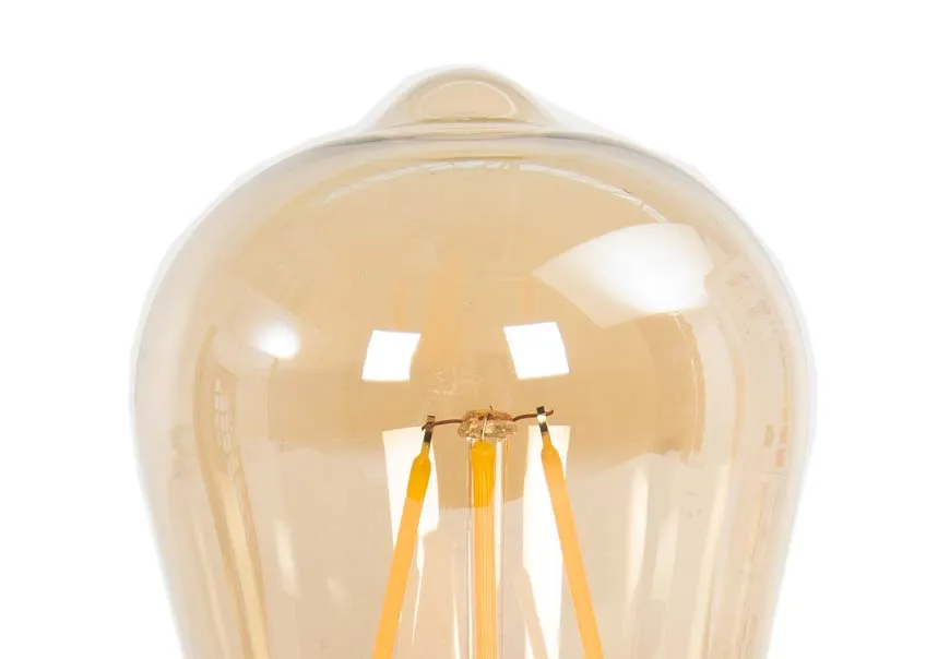 A 4w angular amber light bulb with gold fitting and visible element from EZ Livings Vintage LED range. Closeup of element