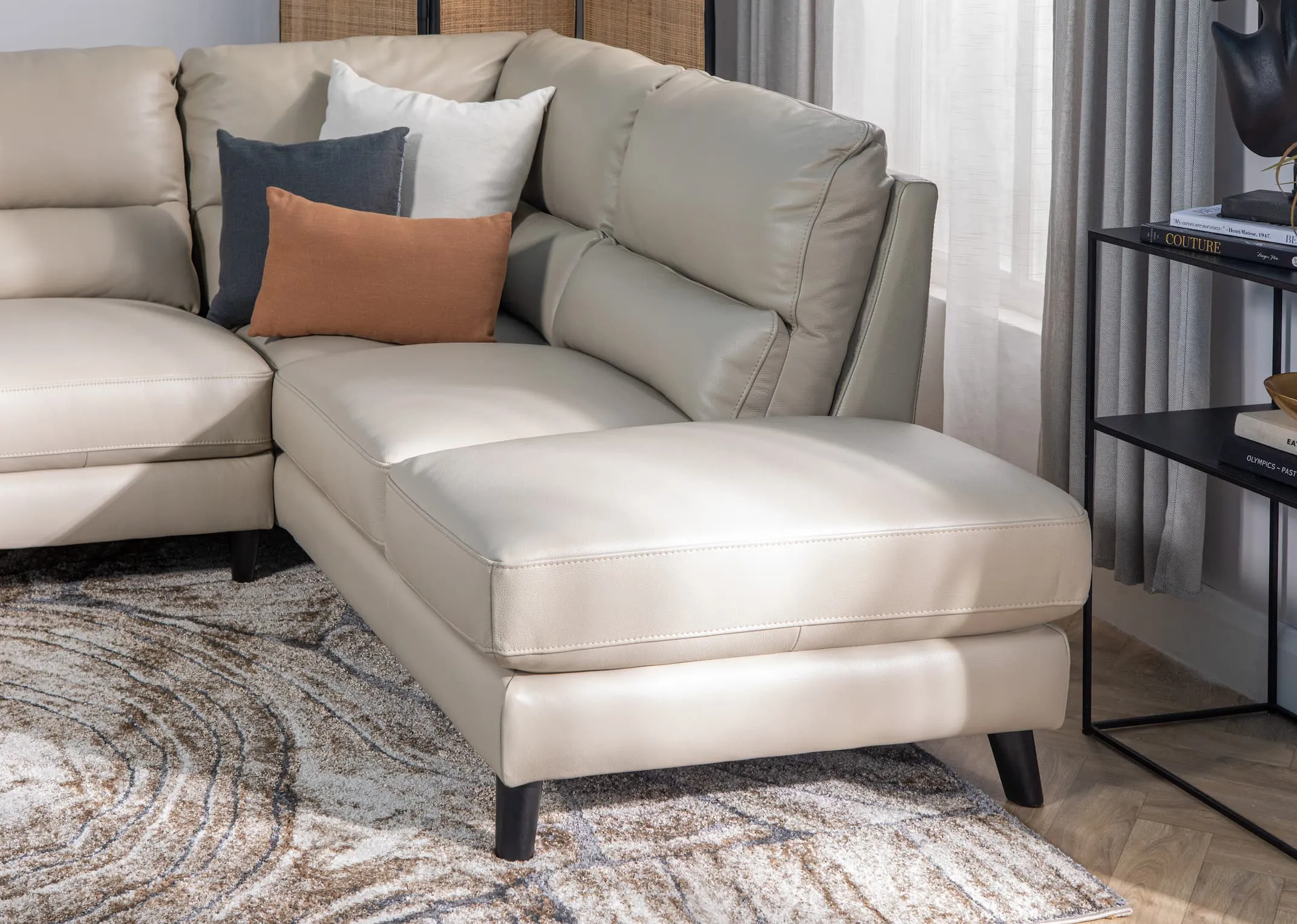 A lifestyle image of the Alfredo grey corner chaise with closeup detail shot of the chaise and cushions