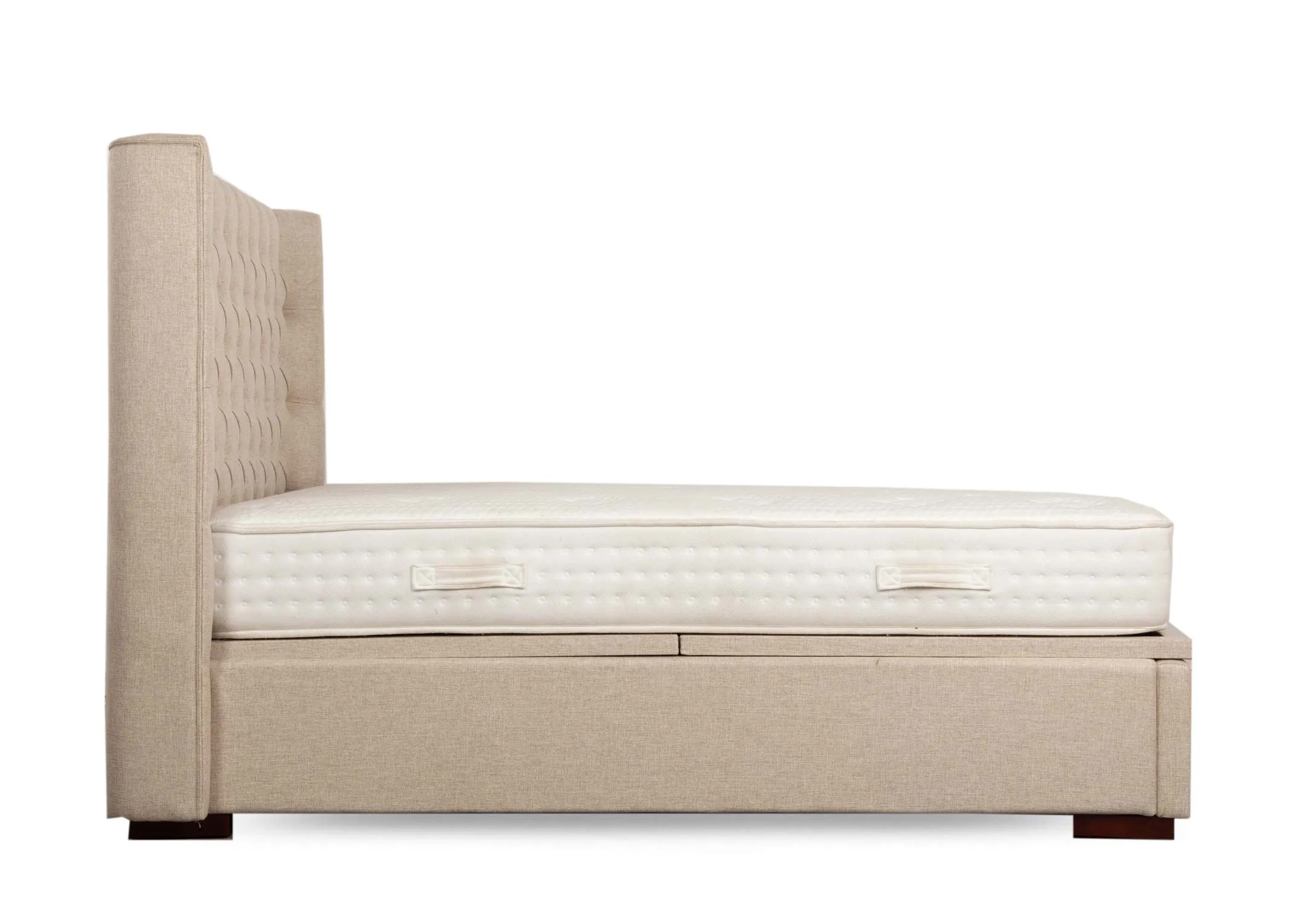 A 6ft super king size beige linen ottoman bed from EZ Livings Chester range. Side view of winged headboard