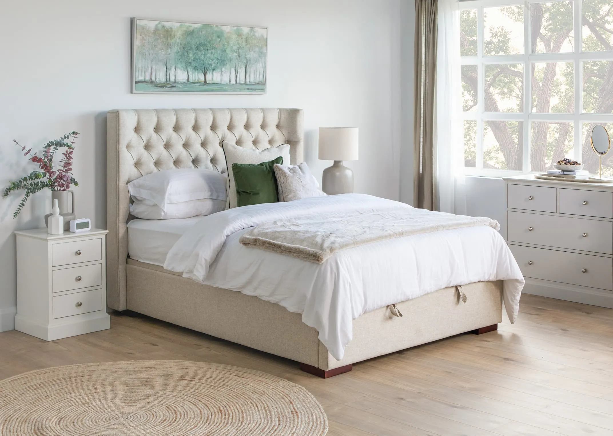 A lifestyle image of the Chester Bed with rivendale lockers and chest with Retro lamp with Daydream canvas