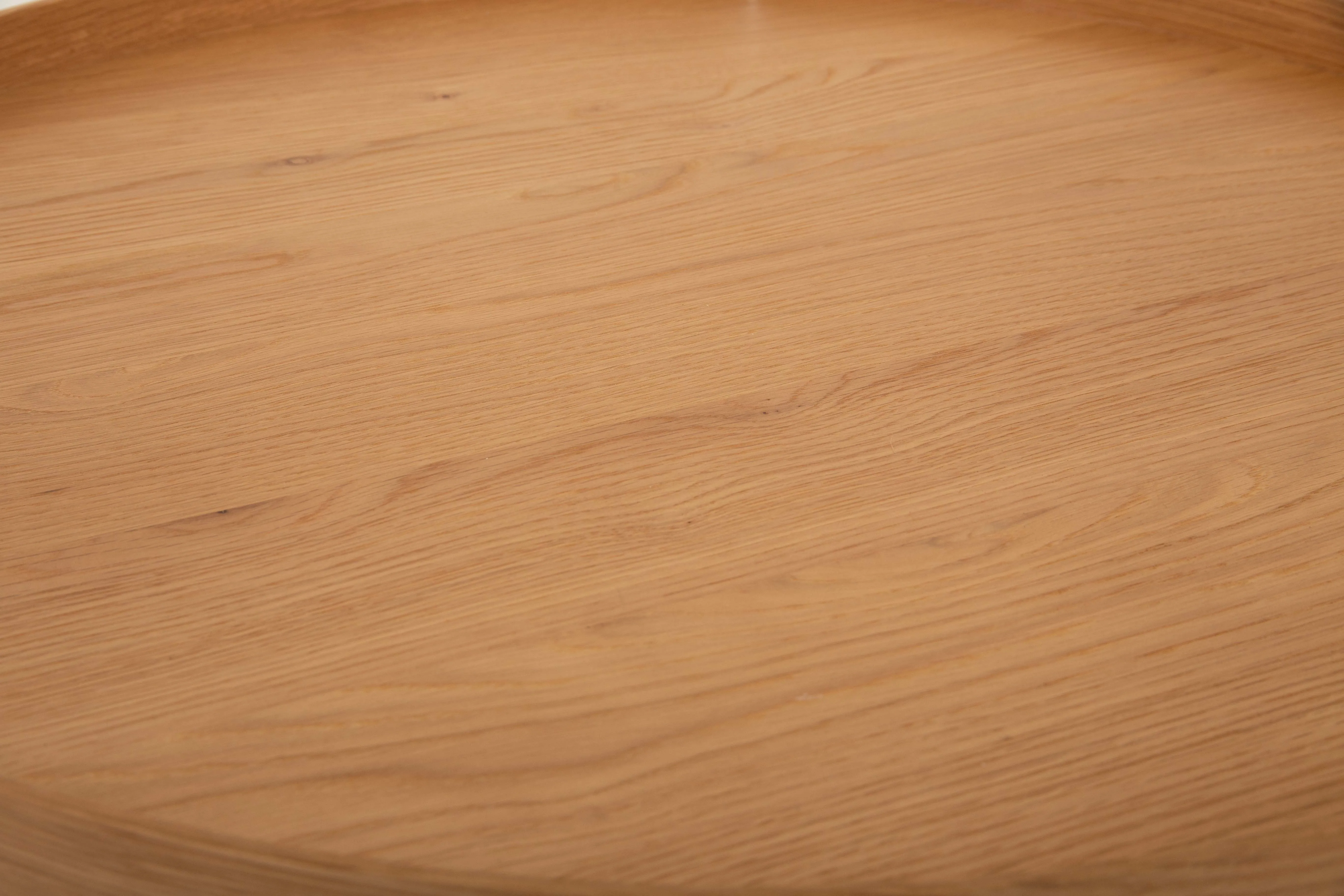 A low oak round coffee table from EZ Livings Trieste range. Front view