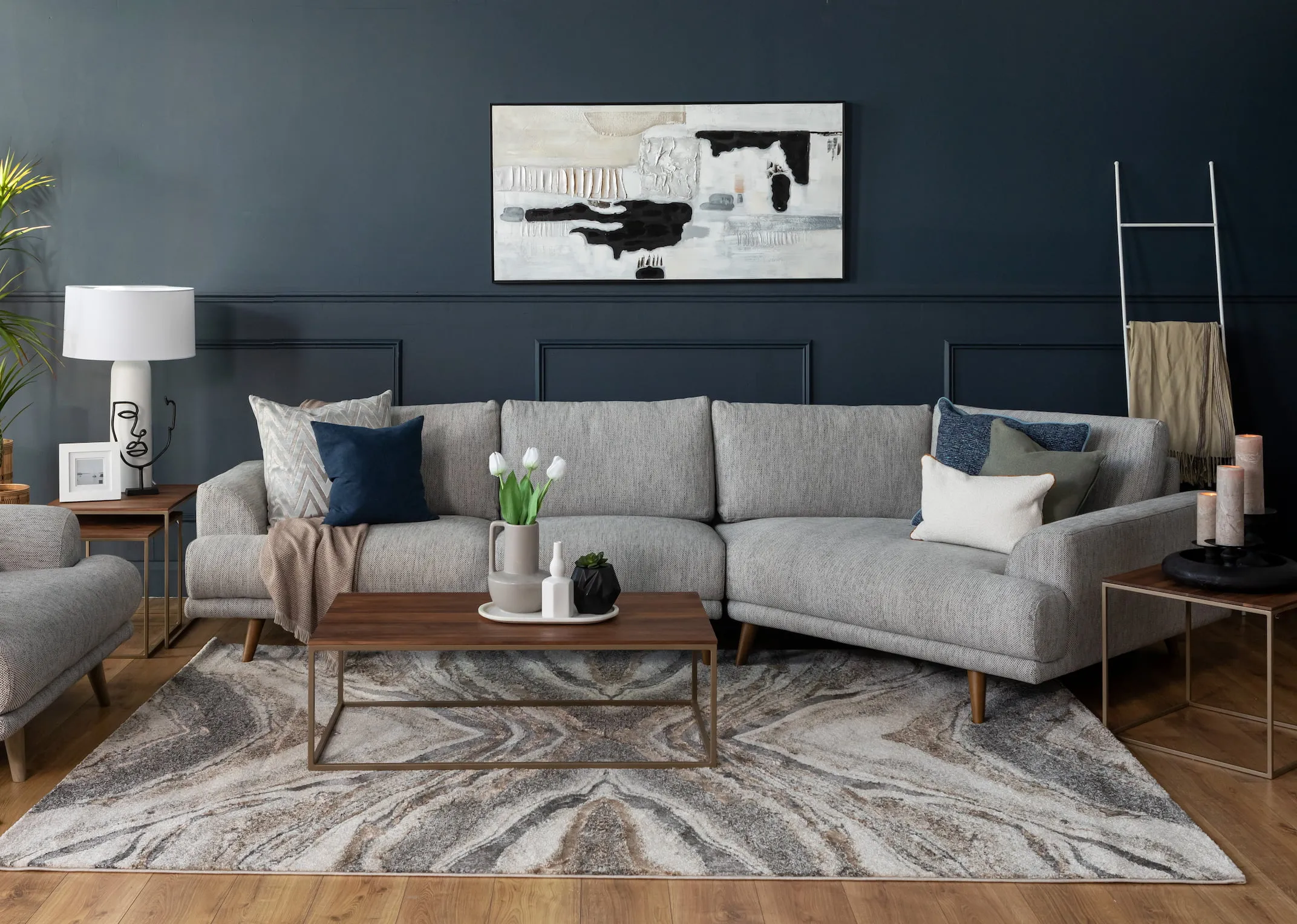 A lifestyle image of the Legend Corner Sofa with avanto rug and aston coffee table