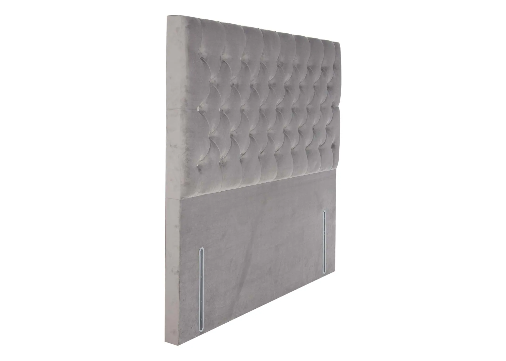 A grey velvet button detail headboard in 5ft from EZ Livings Palermo range. Angled view of thick headboard