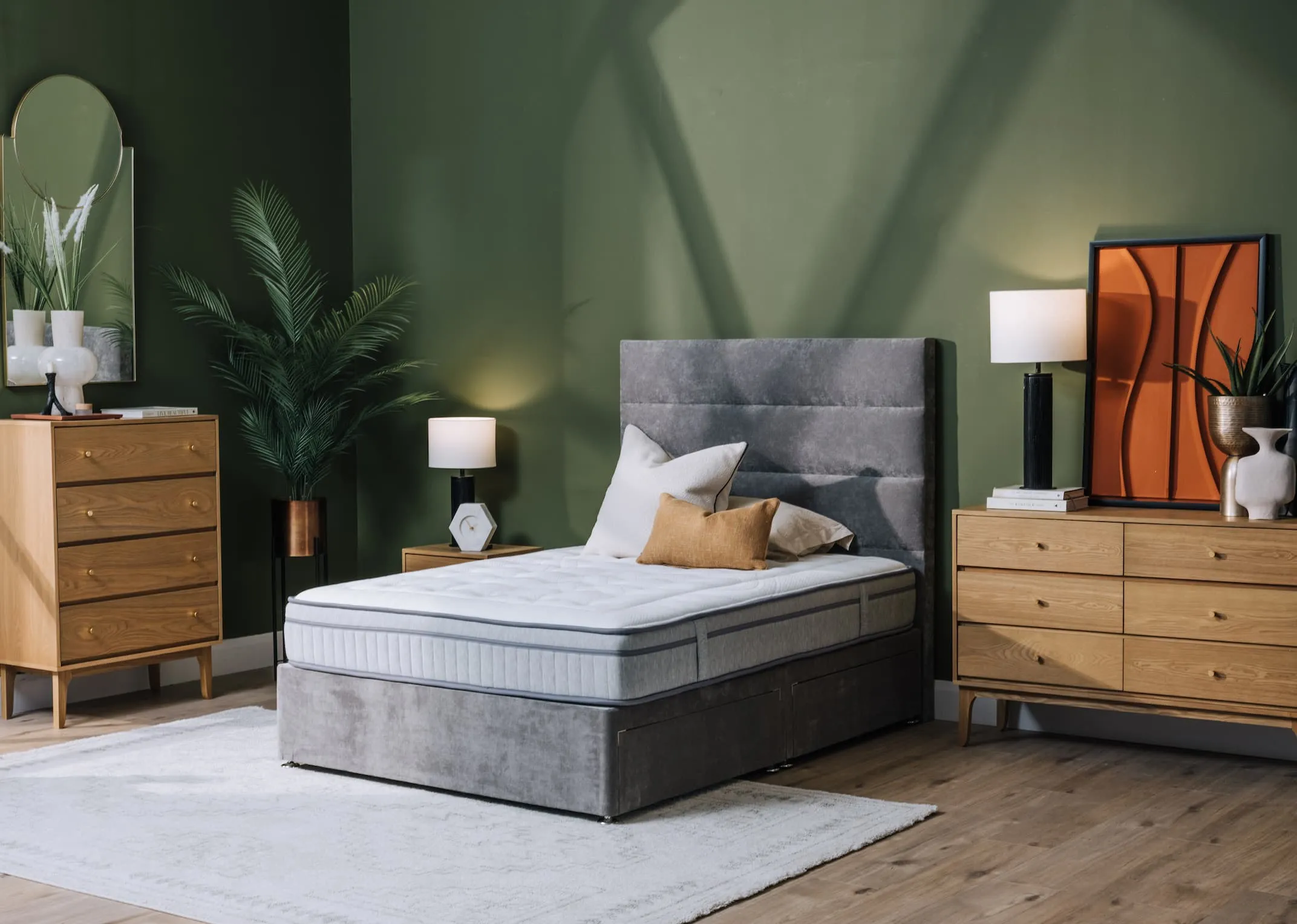 A lifetsyle image of the Florence Bed base with Modena headboard and Firmrest mattress with Oak Chests.
