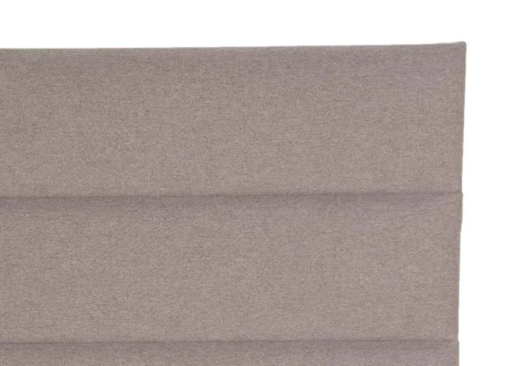 A light grey linen headboard with 3 rows from EZ Livings Florence range. Closeup view