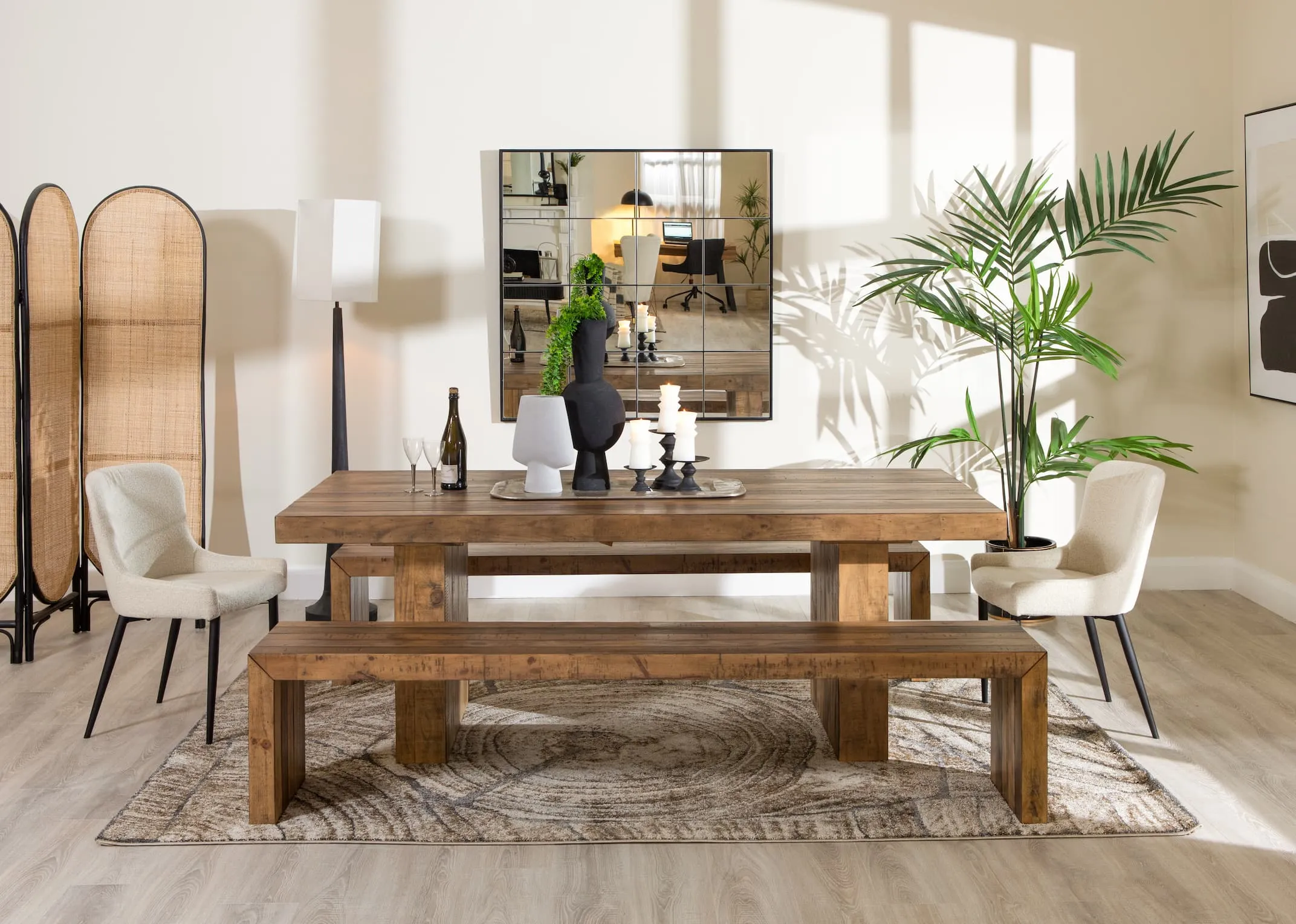 A lifetsyle image of the Polygon dining table with Ontario chairs and Faith mirror.