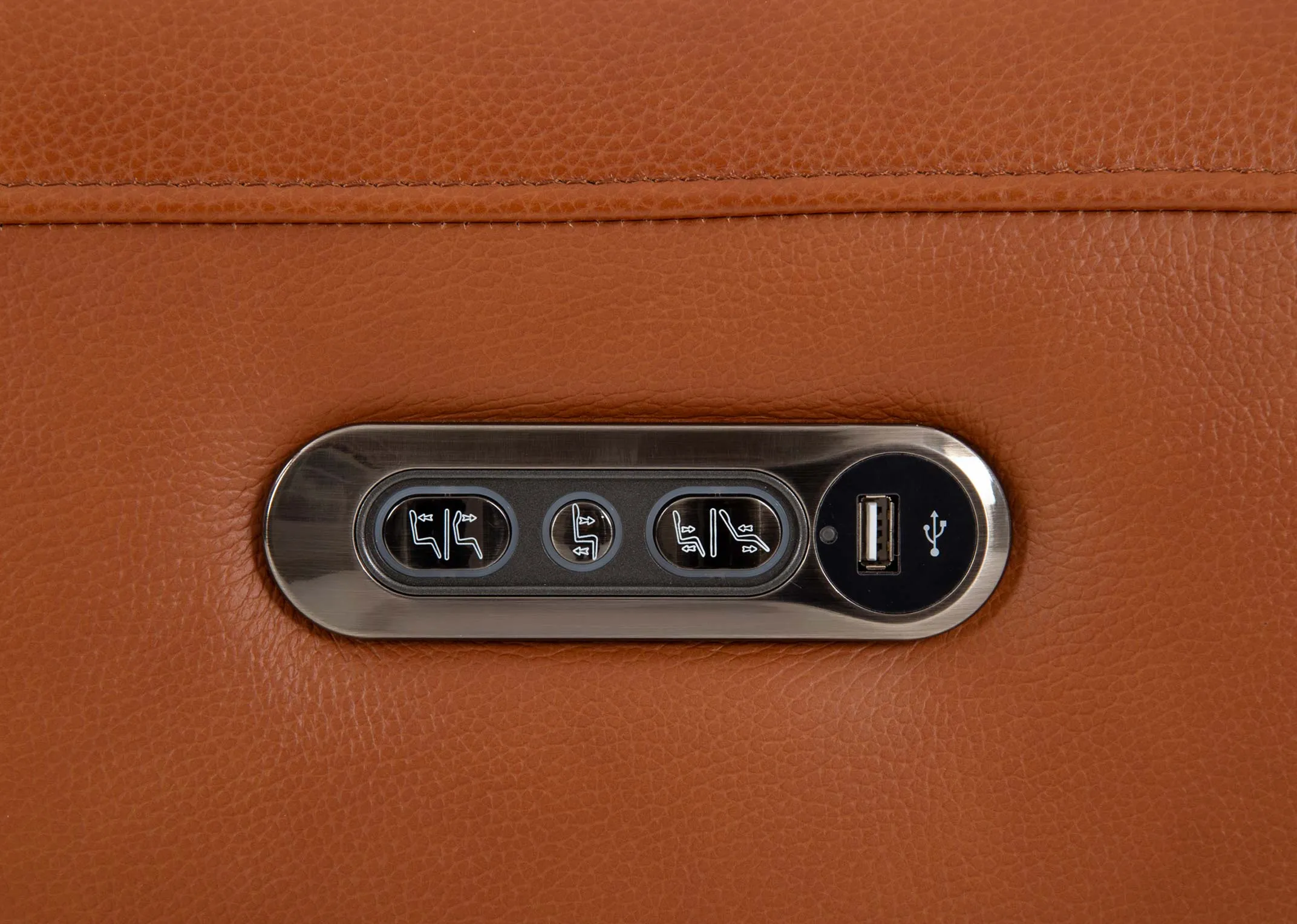 A tan leather 3 seater power reclining sofa from EZ Livings Icon range.Closeup view of power buttons