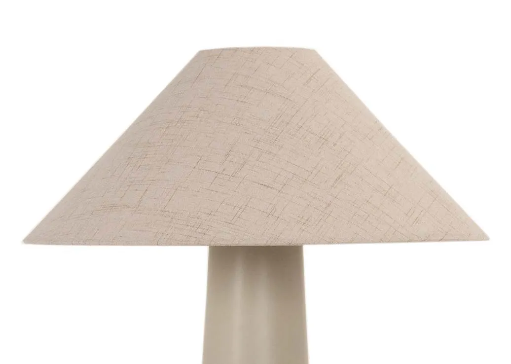 A taupe table lamp with cermaic base and beige shade from EZ Livings Daisy lamp.A taupe table lamp with cermaic base and beige shade from EZ Livings Daisy lamp.