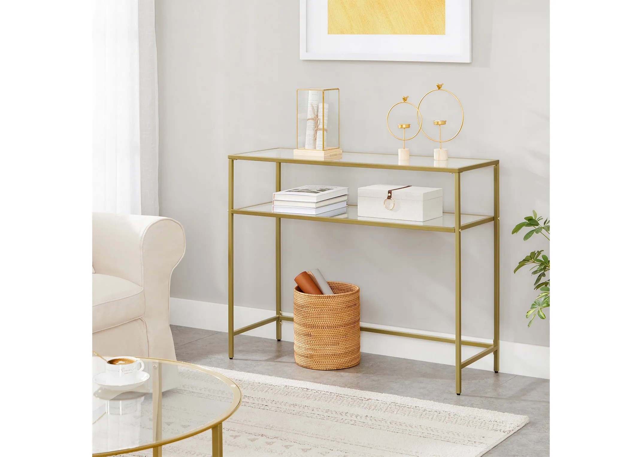 A gold frame console table with 2 glass shelves from EZ Livings Zafon range.
