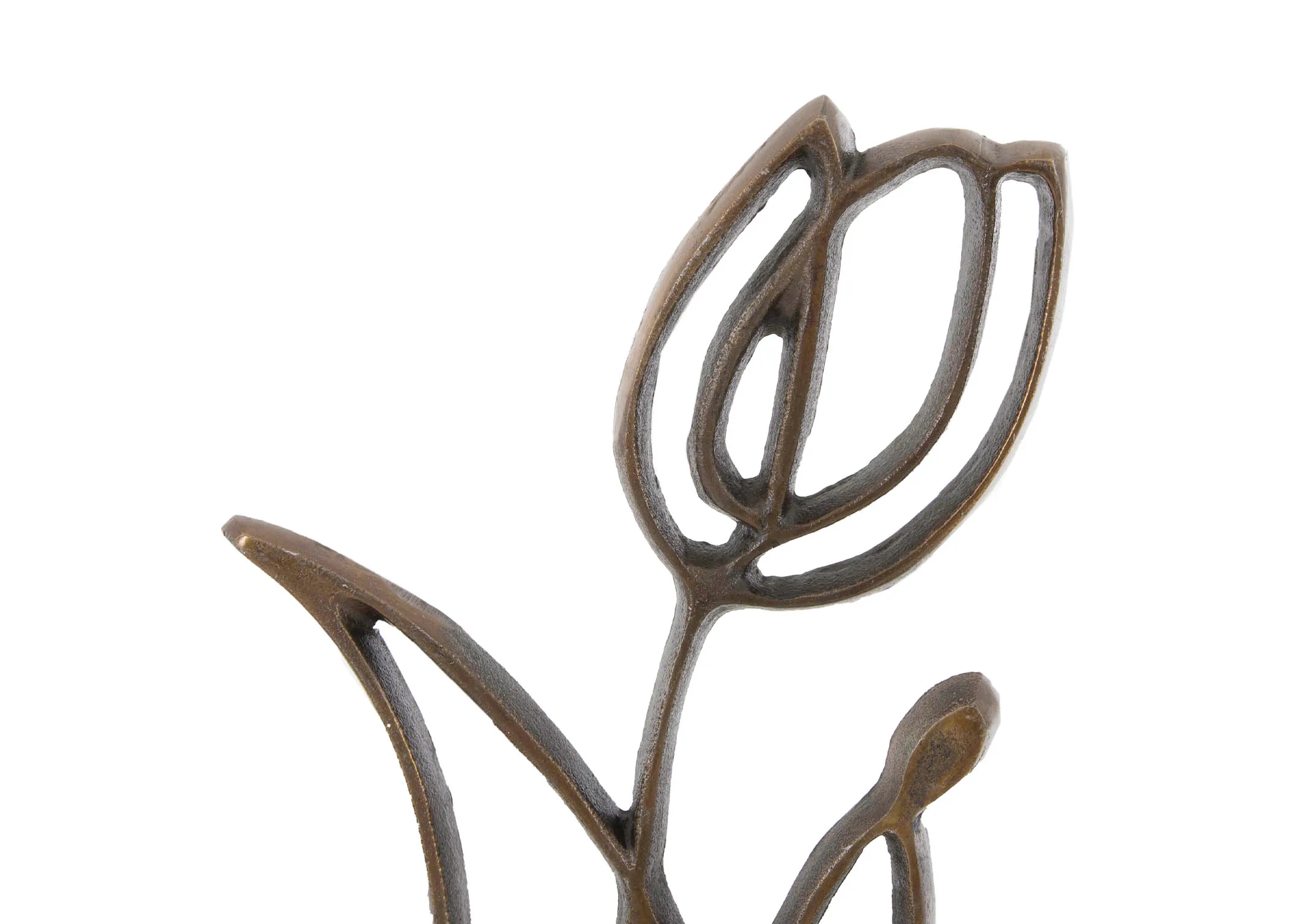 An antique bronze ornament of a tulip outline on a base from EZ Livings Tulipanu range. Closeup of flower