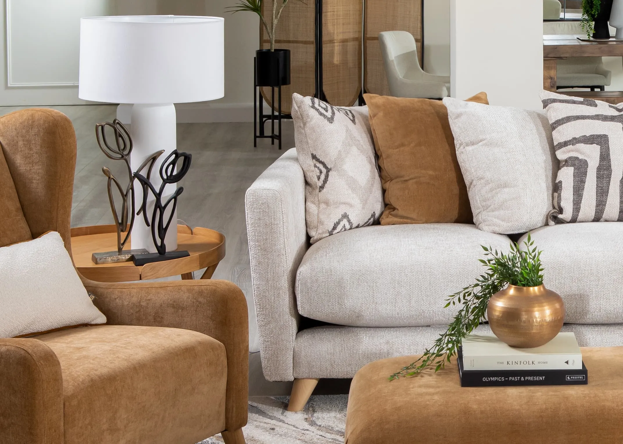 A lifestyle image of the Tulipanu bronze large and small black with Trieste tables and Ponti/Carrie sofas